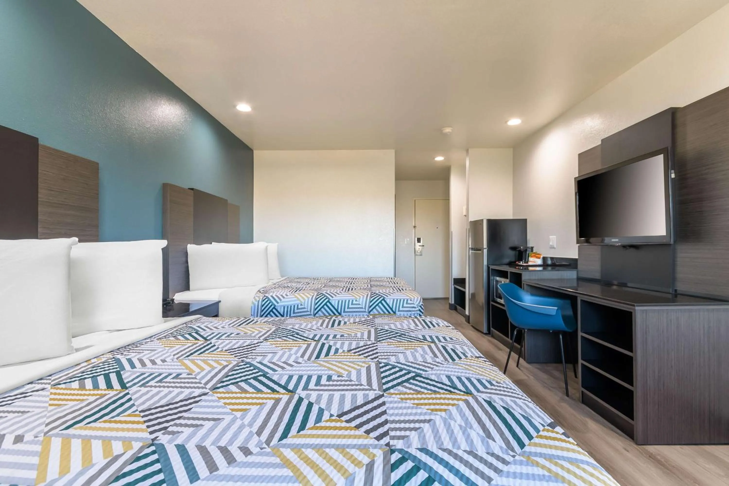 Bedroom, Bed in Studio 6 Suites Perris, CA