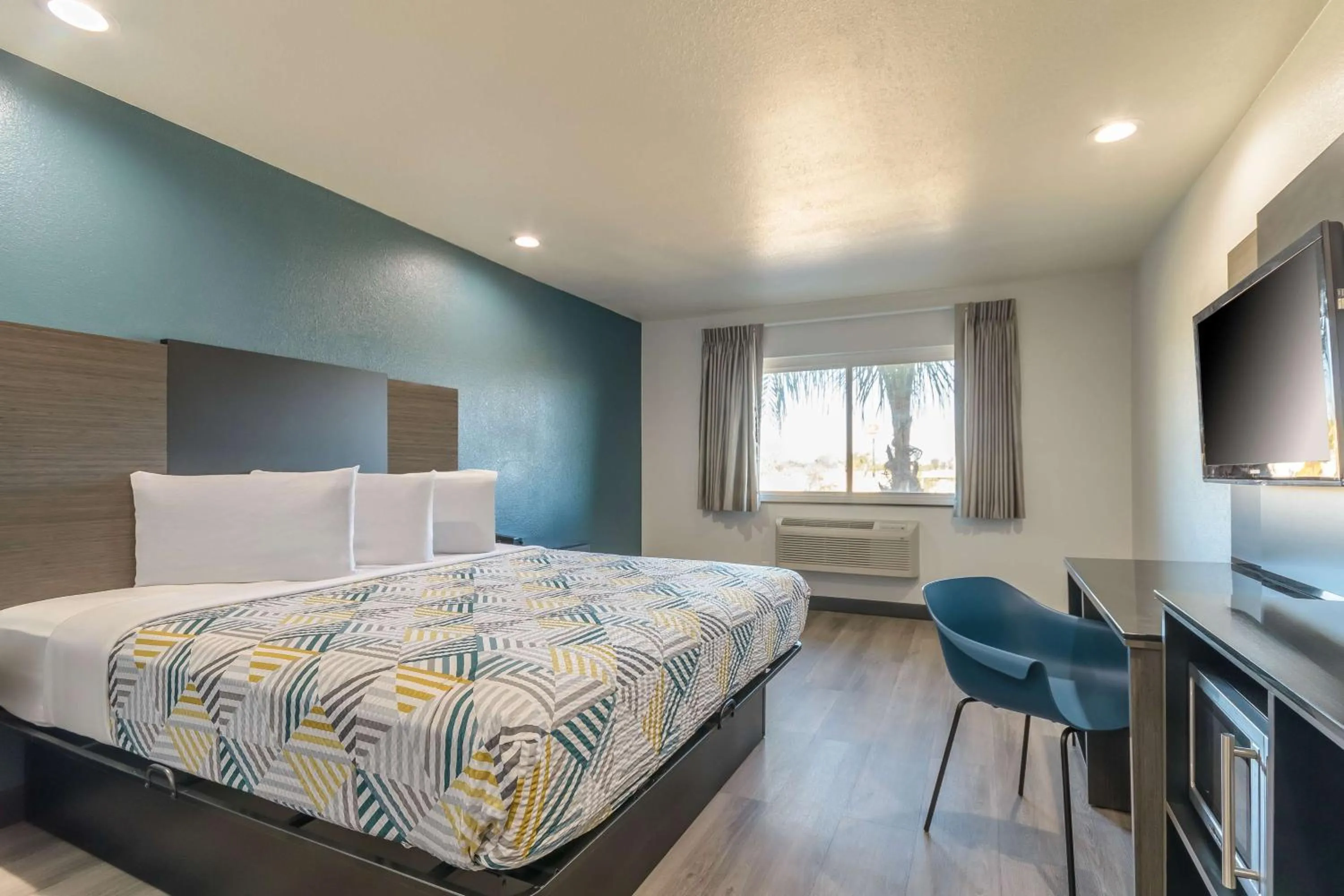 Bedroom, Bed in Studio 6 Suites Perris, CA