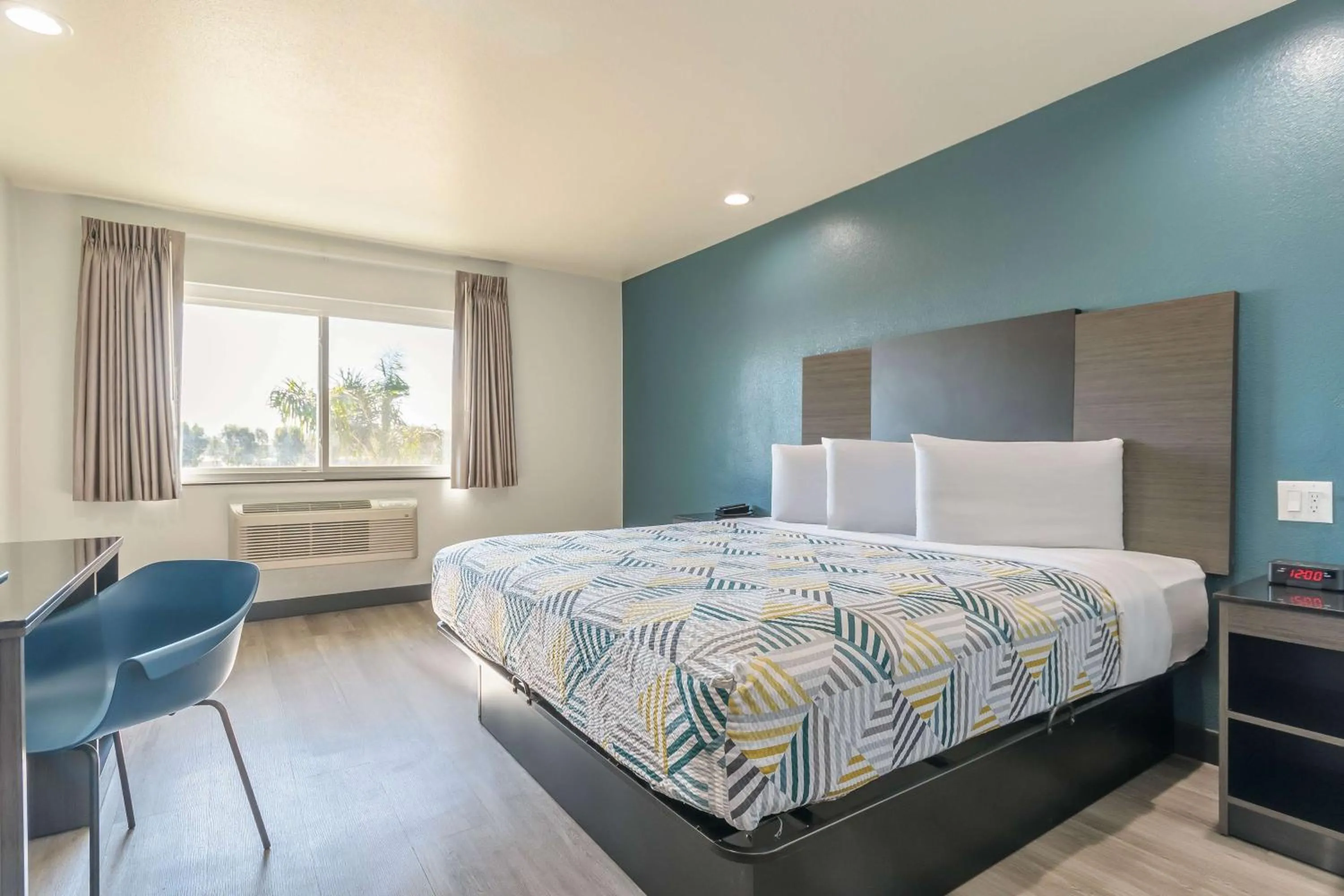 Bedroom, Bed in Studio 6 Suites Perris, CA