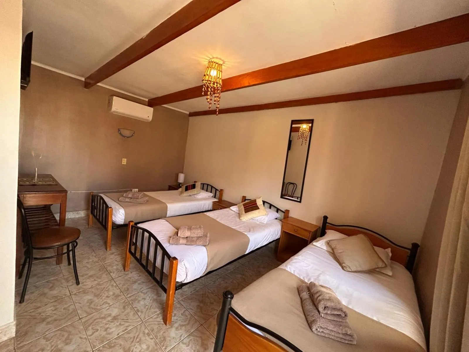 Photo of the whole room, Bed in Hostal Katarpe