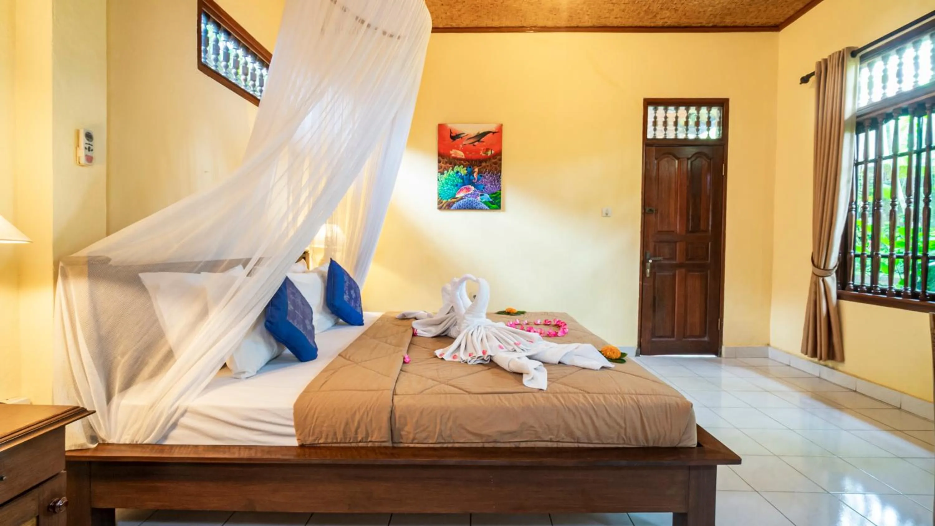 Bed in Cafe Wayan Cottages Senggigi