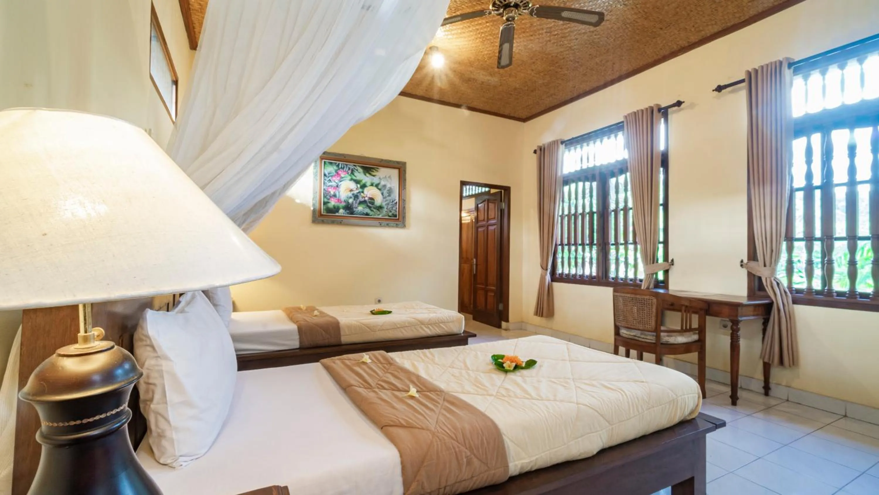 Bed in Cafe Wayan Cottages Senggigi