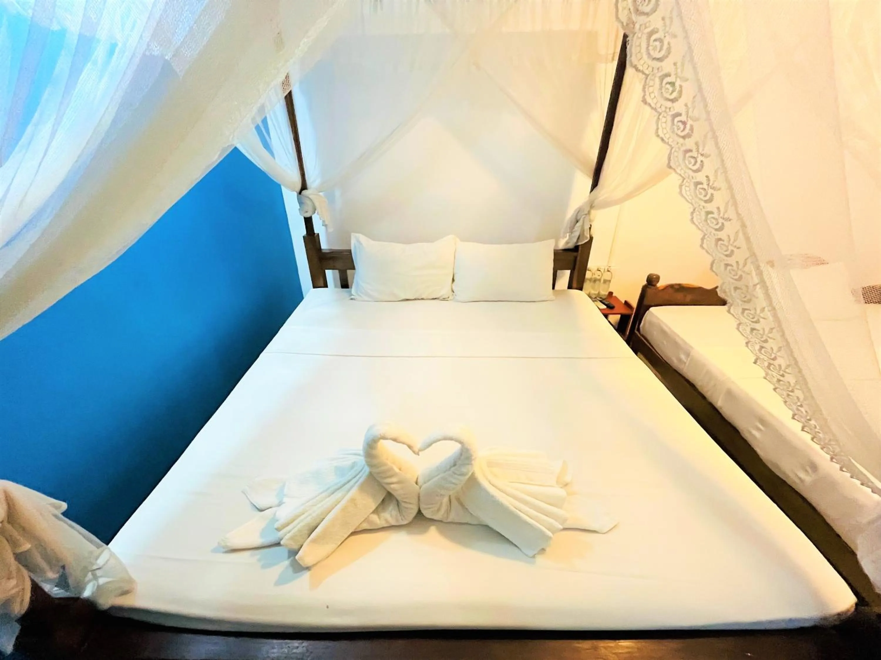 Bed in Palitha Homestay