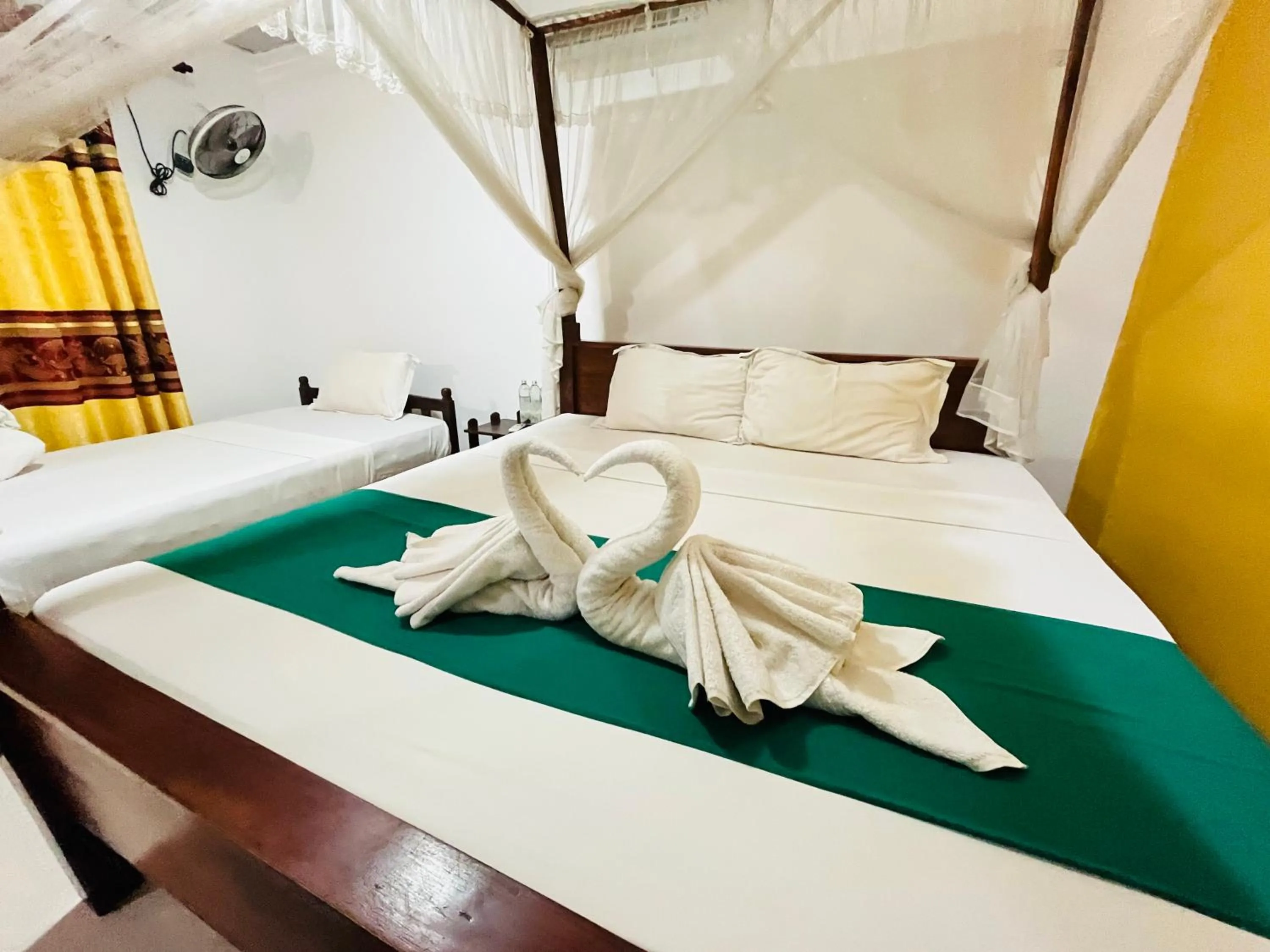 Bed in Palitha Homestay