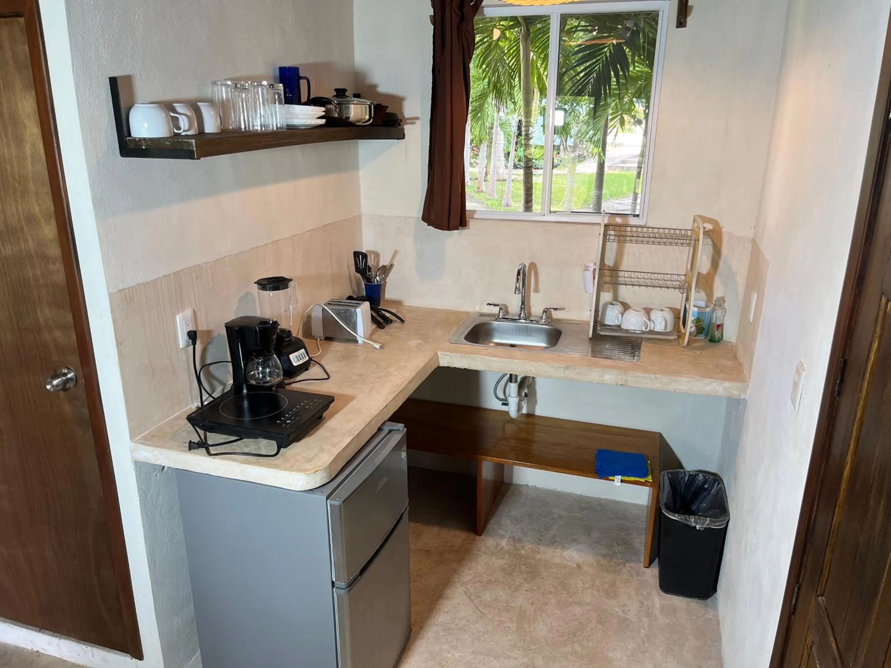 Kitchen or kitchenette in Xanthus Hotel
