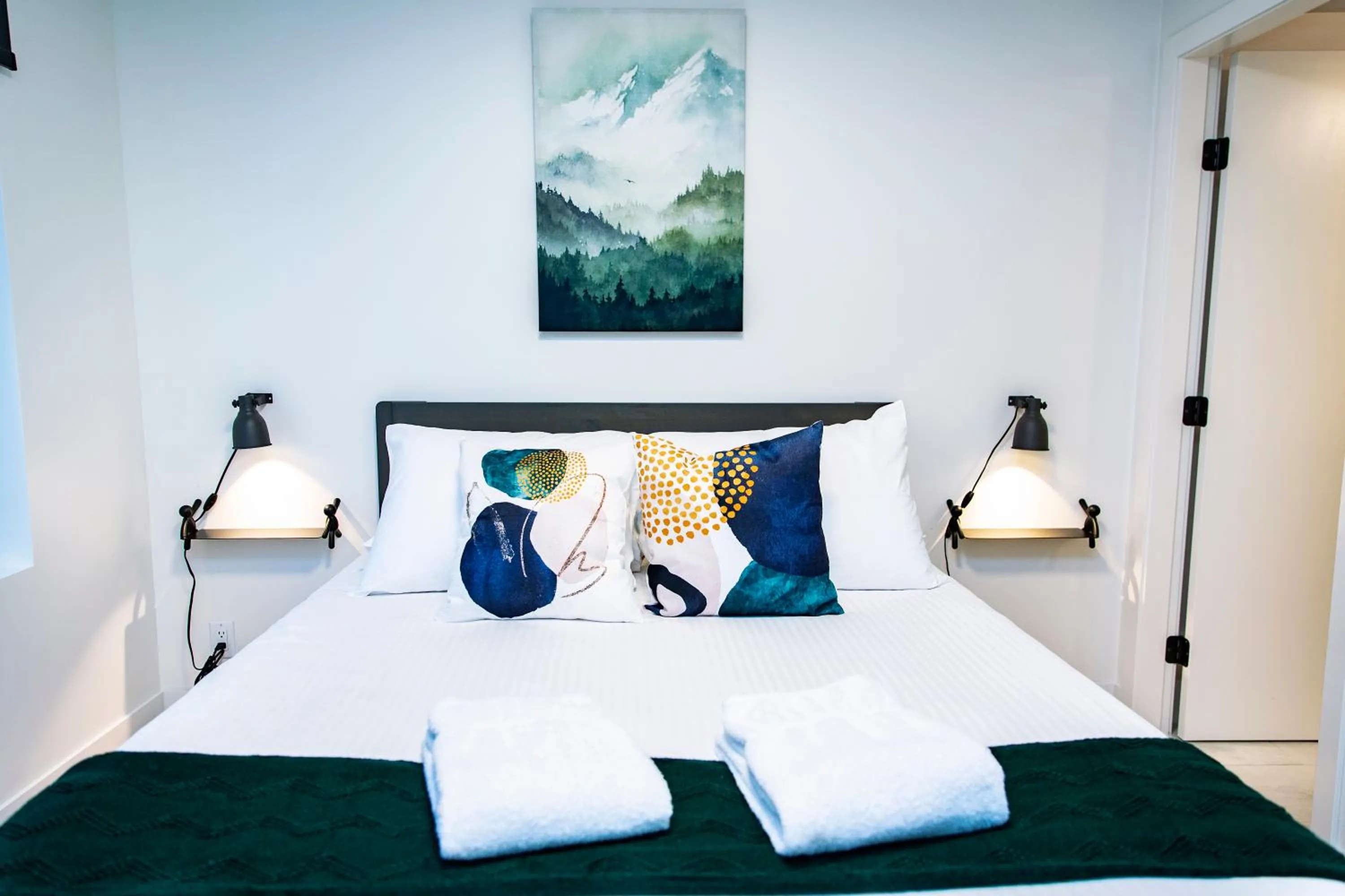 Bed in Separate Reality Retreat by Revelstoke Vacations