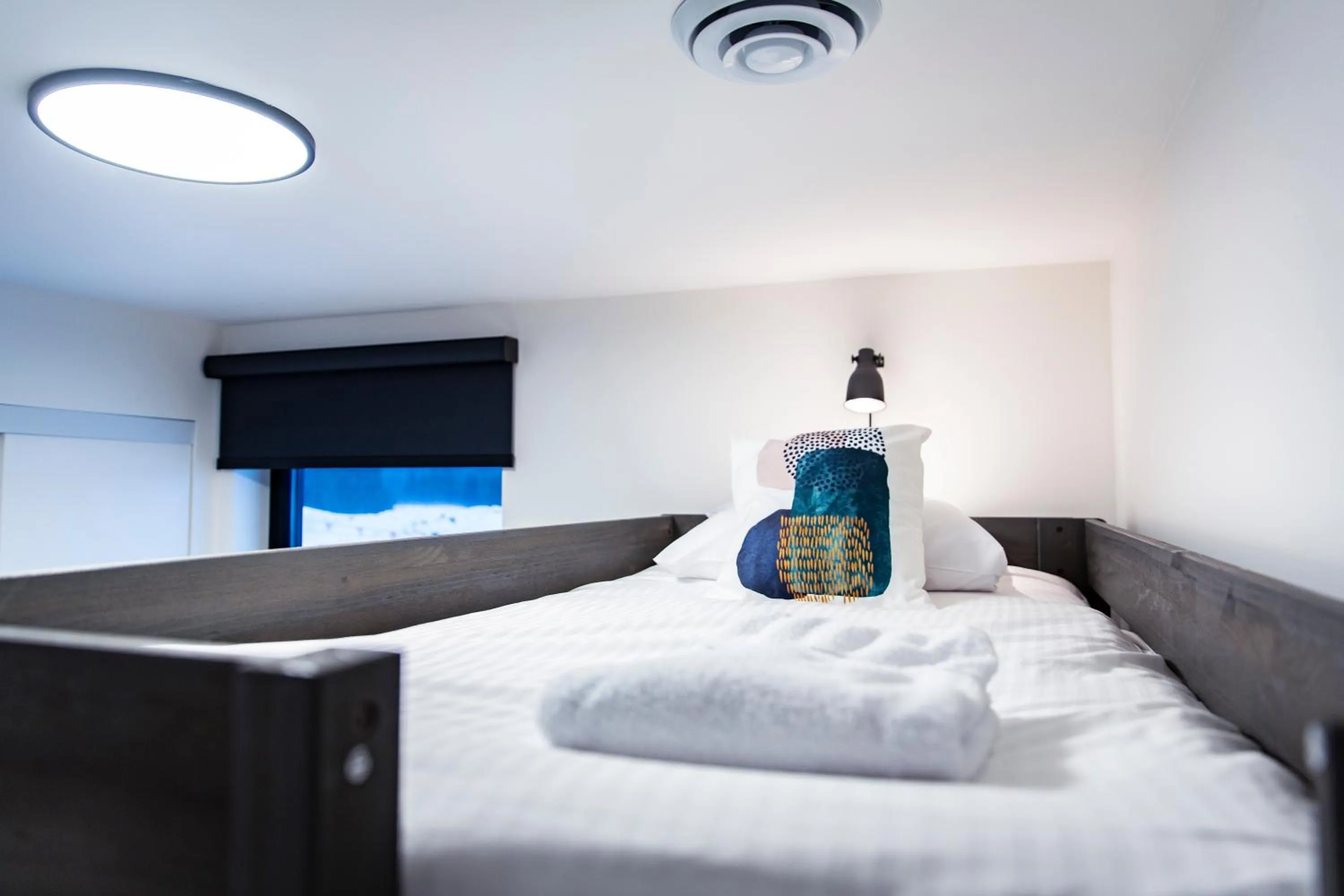 Bed in Separate Reality Retreat by Revelstoke Vacations