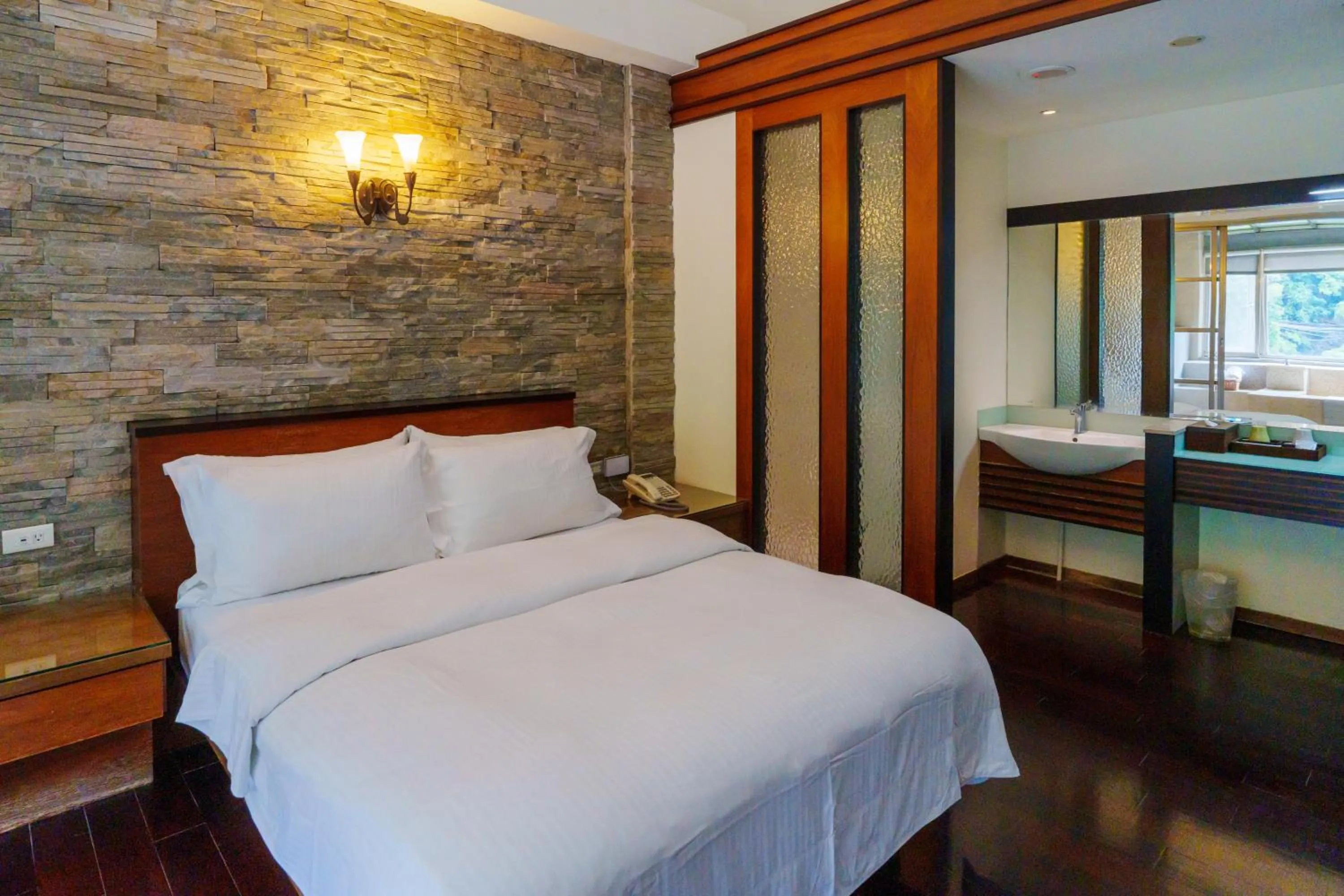 Bed in Spring Spa Hotel