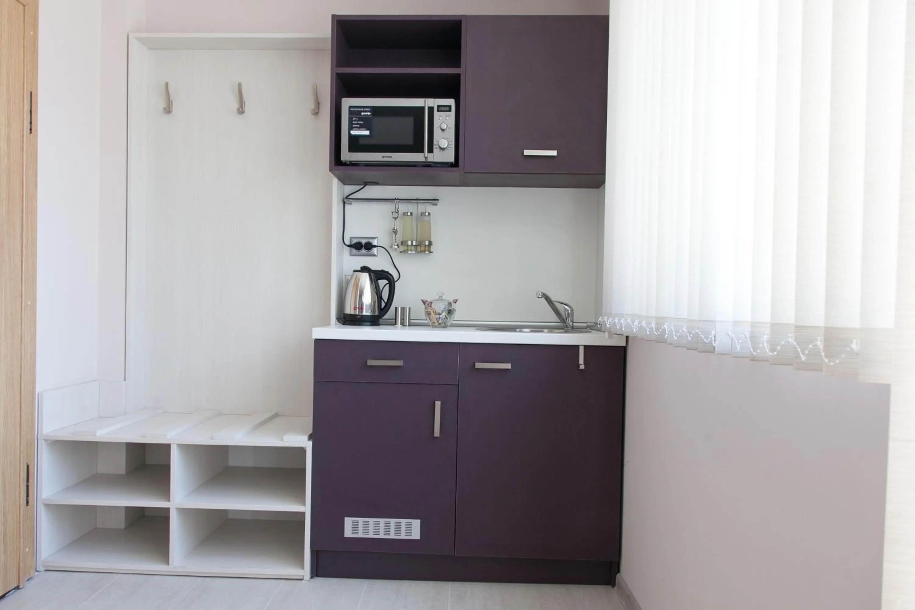 Kitchen or kitchenette in Sky Apartments