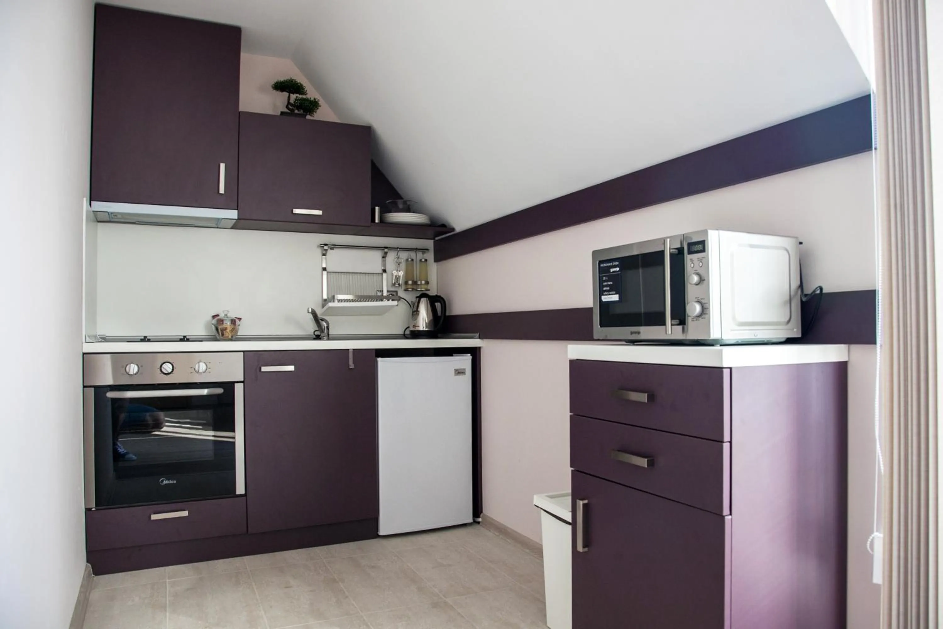 Kitchen or kitchenette in Sky Apartments