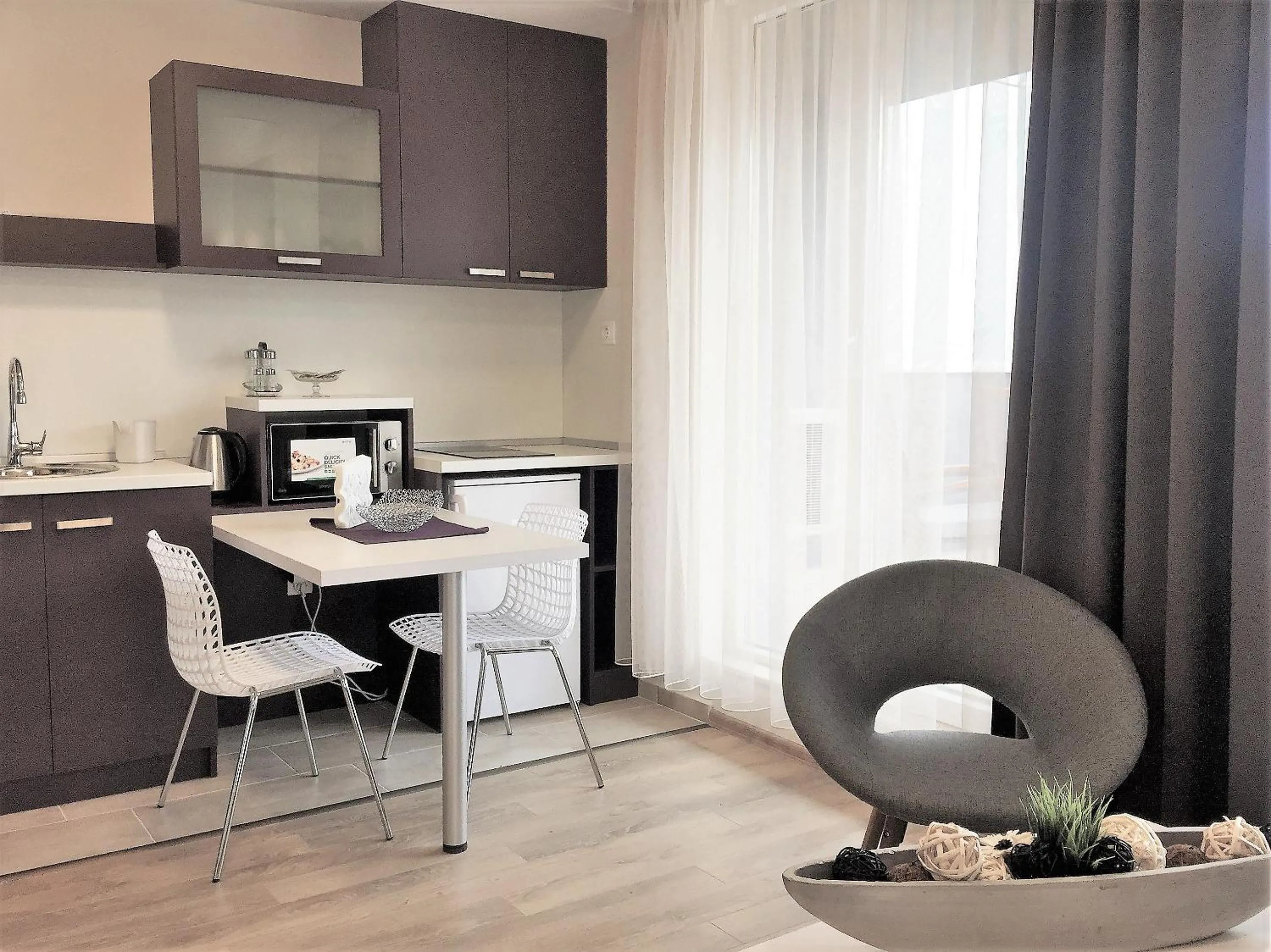 Kitchen or kitchenette in Sky Apartments
