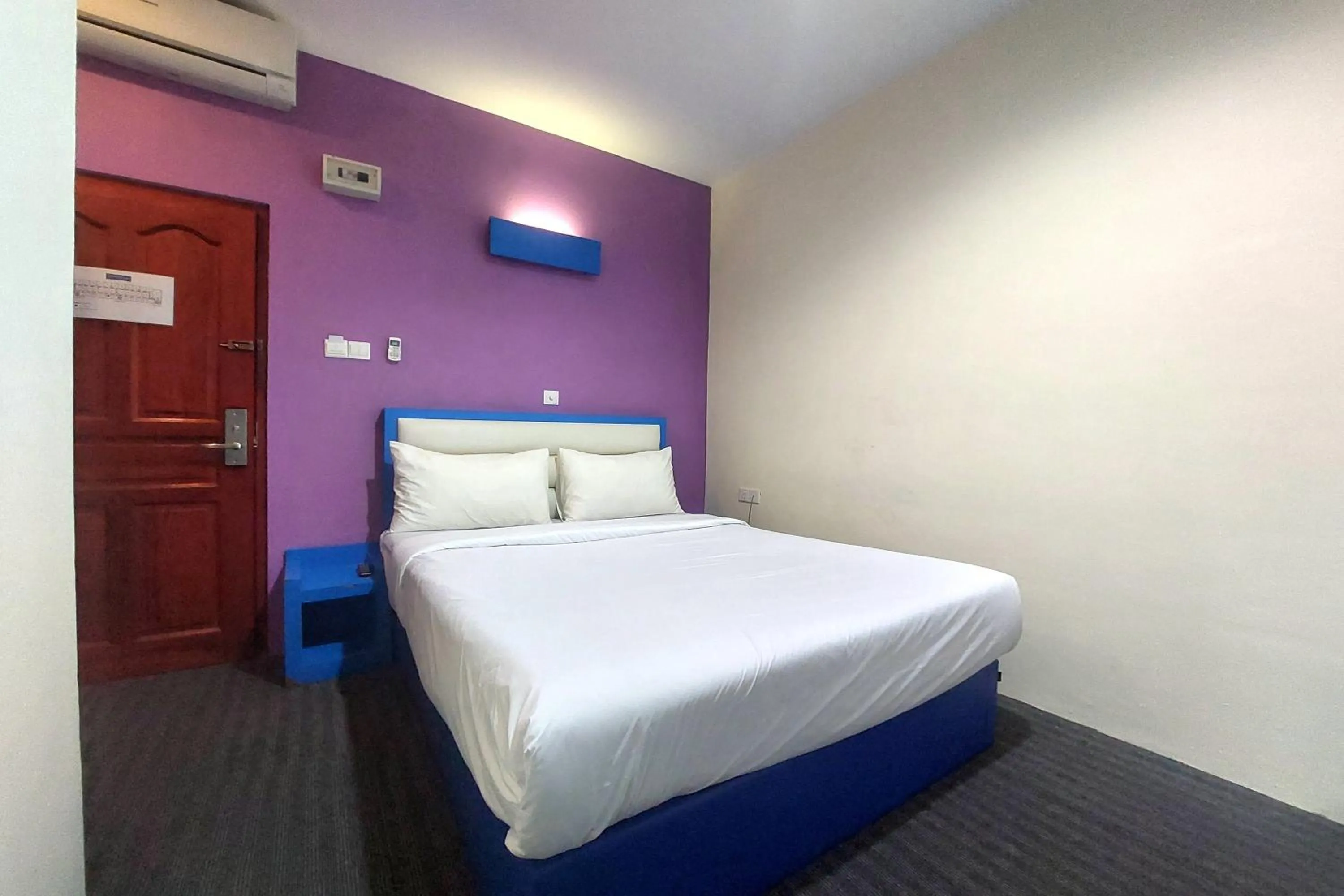 Bedroom in D'MERLION HOTEL