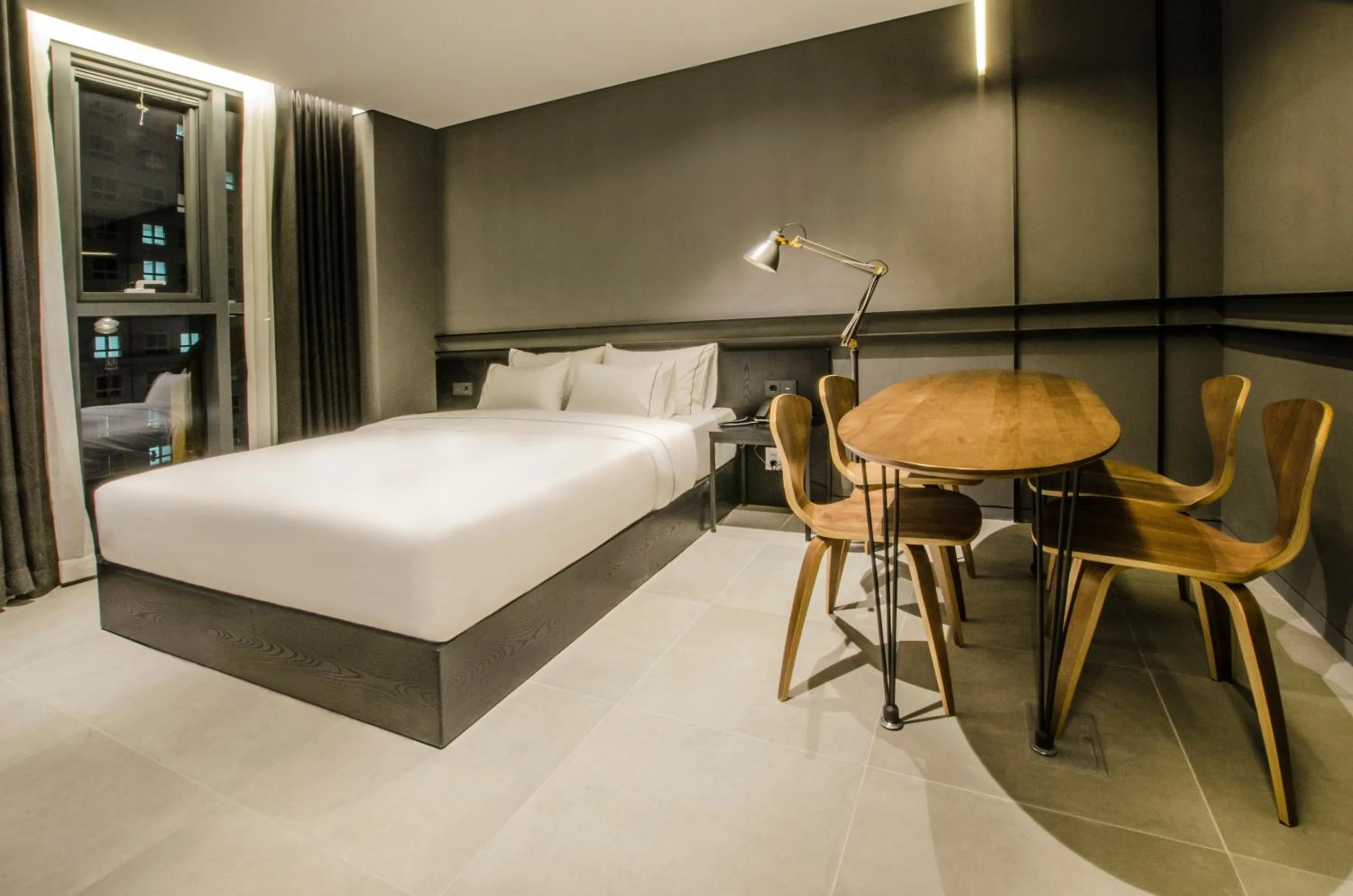 Bed in Hotel The Designers Premier Kondae