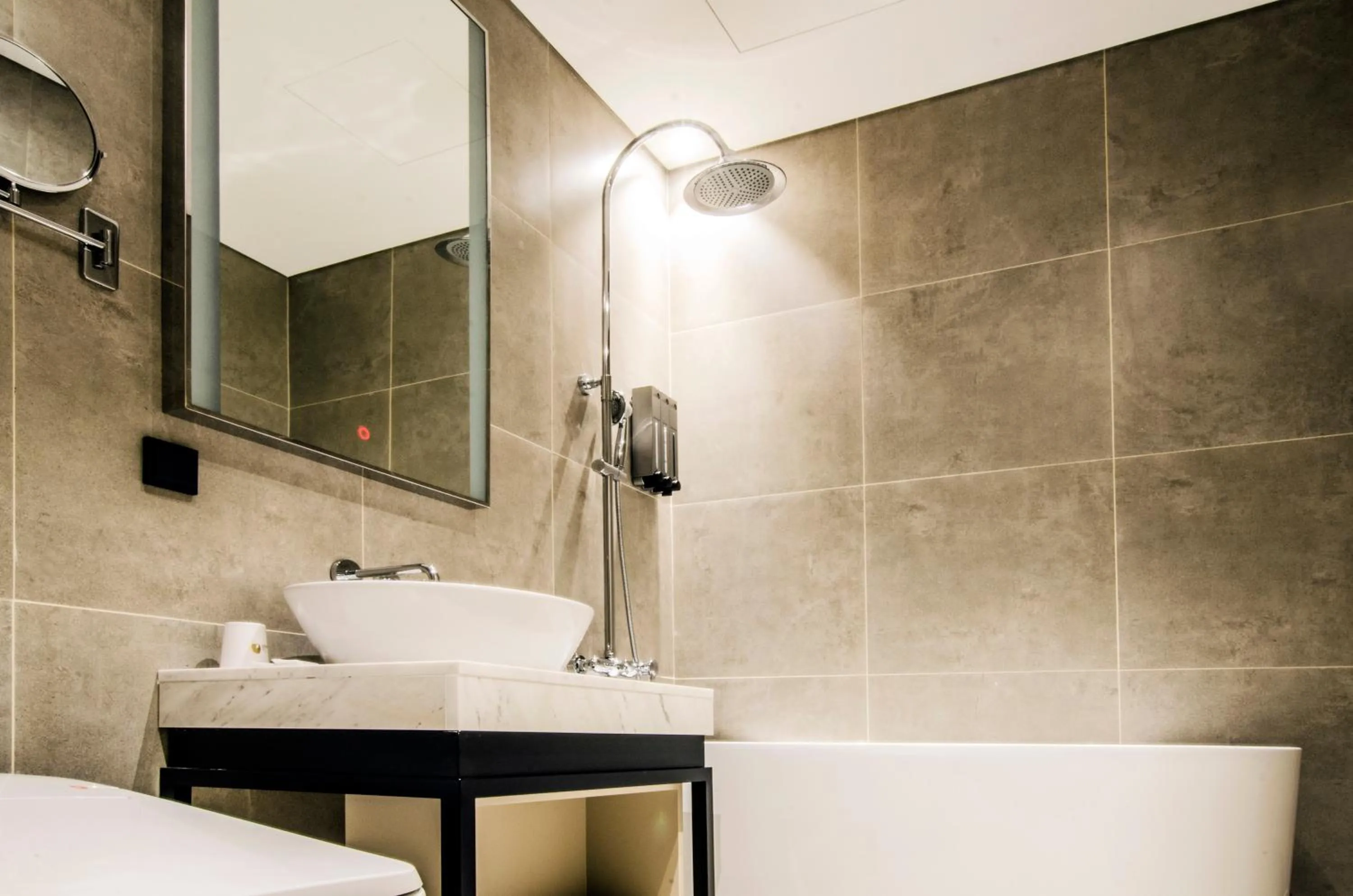 Bathroom in Hotel The Designers Premier Kondae