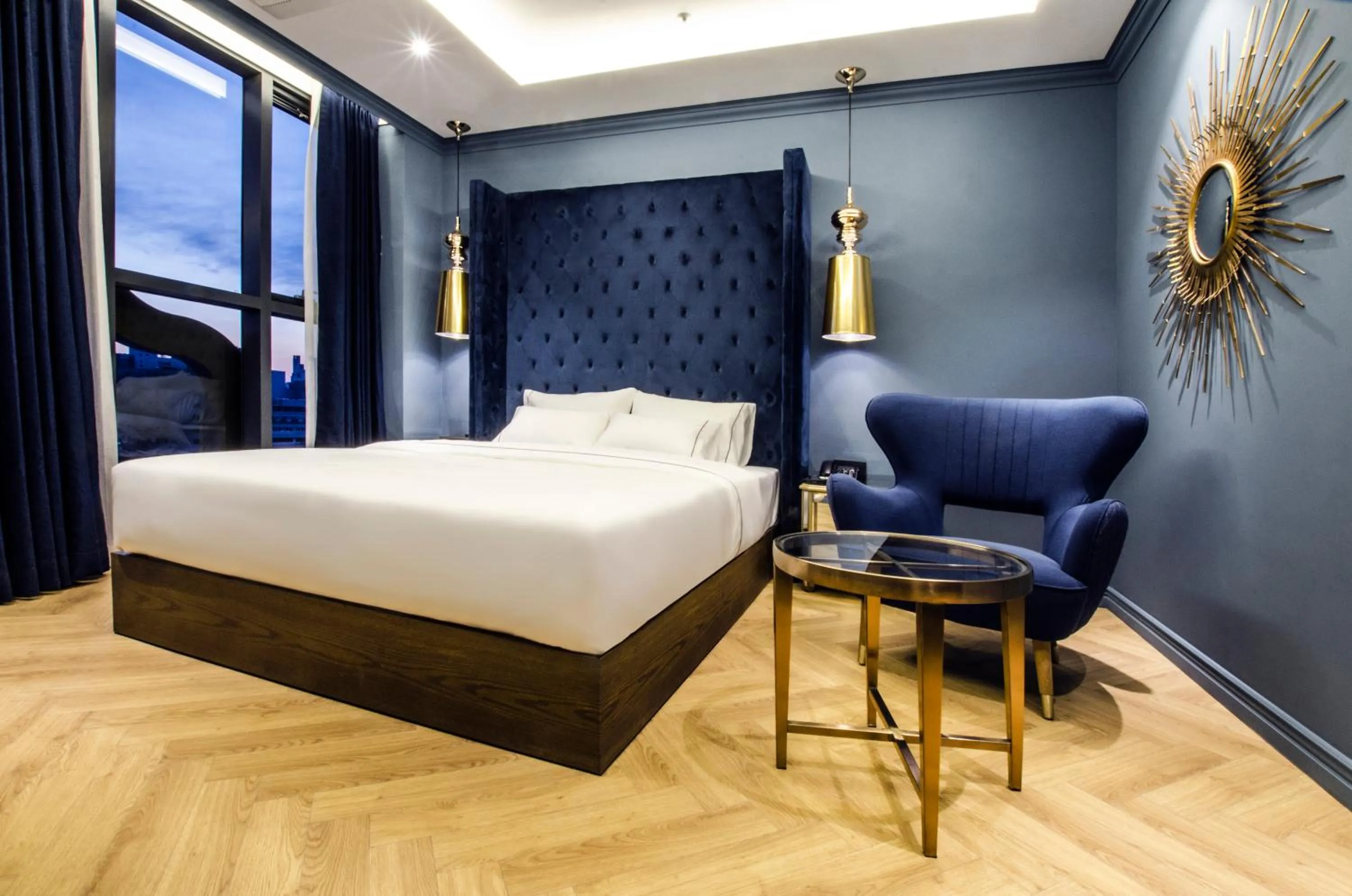 Bed in Hotel The Designers Premier Kondae