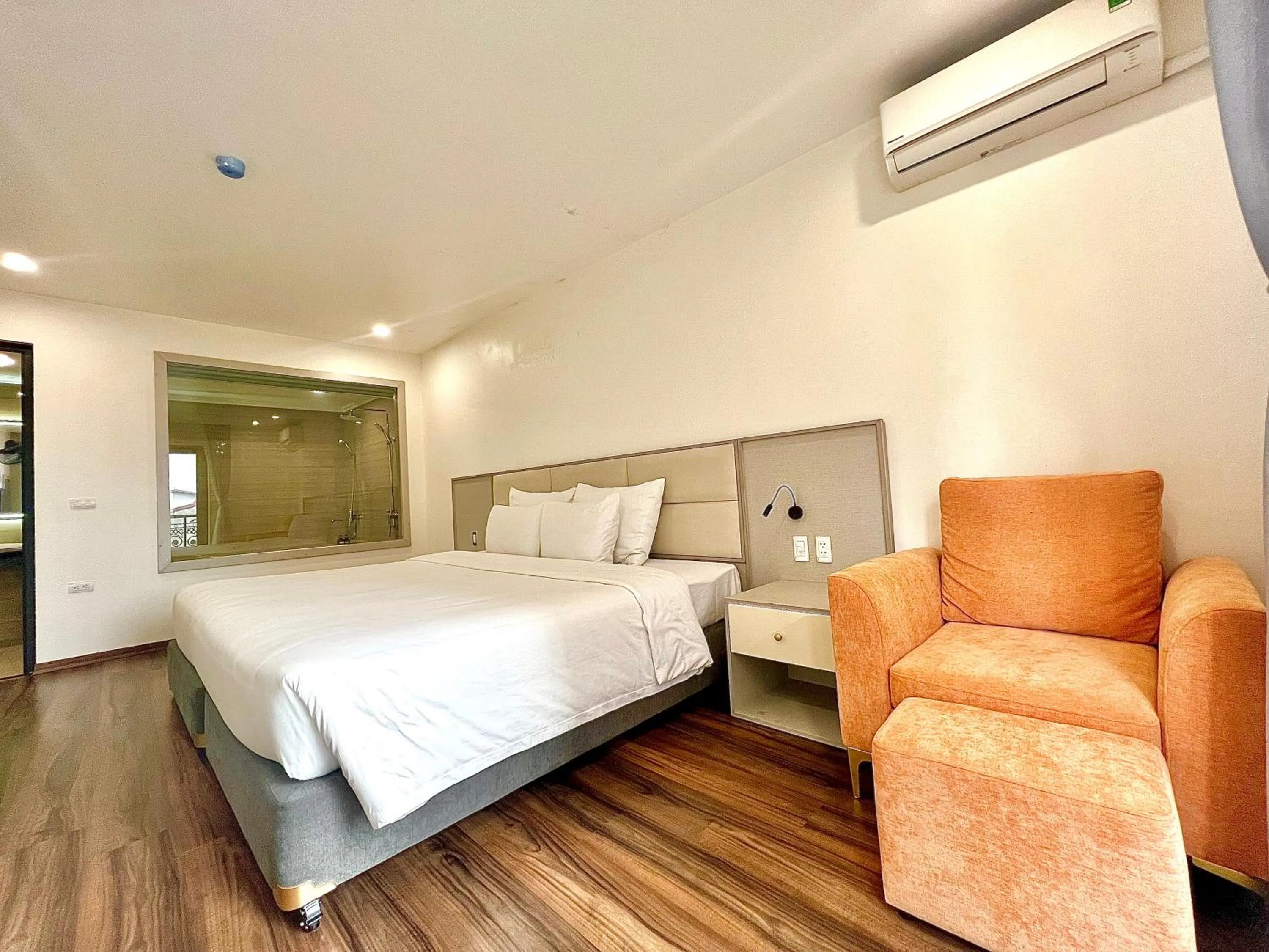 Bed in Grand Dragon Noi Bai Hotel