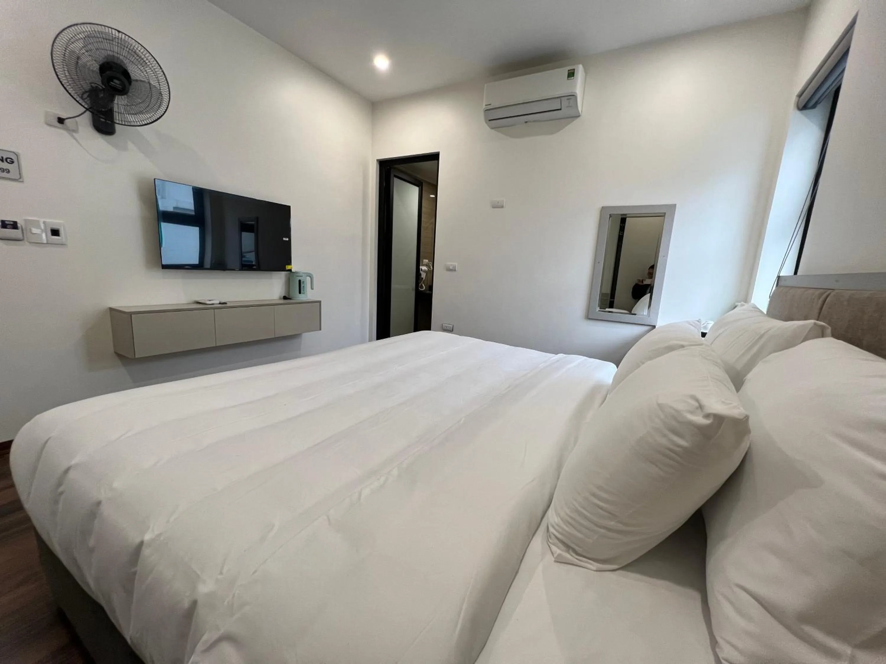 Bed in Grand Dragon Noi Bai Hotel