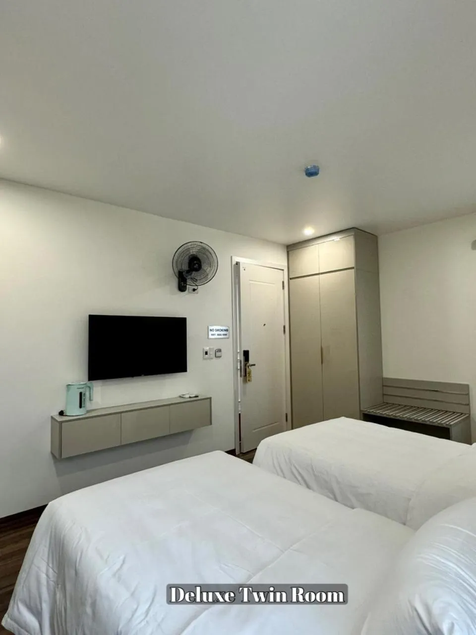 Bed in Grand Dragon Noi Bai Hotel