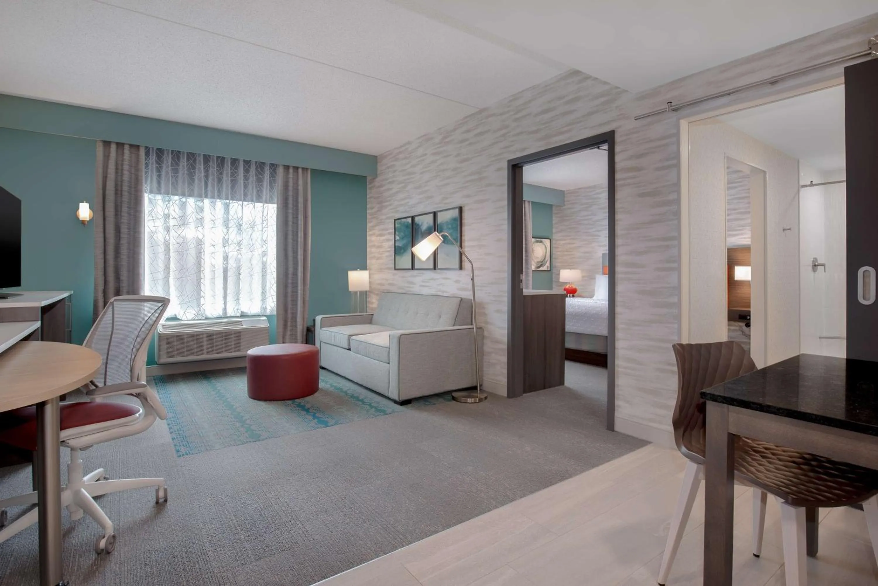 Living room, Bed in Home2 Suites By Hilton Thunder Bay