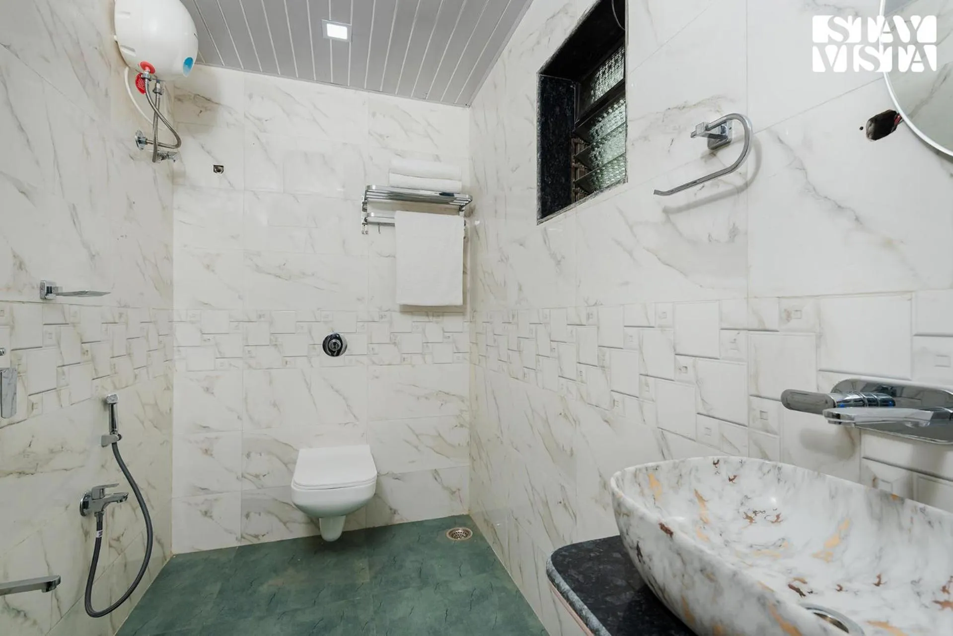 Bathroom in Mango Splash by VEO - Part of StayVista