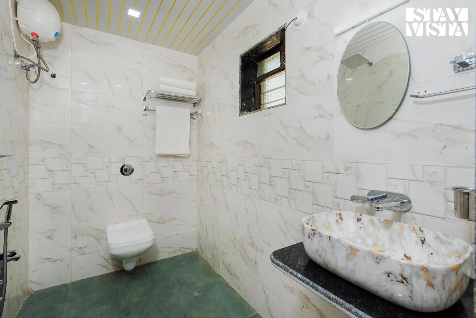 Bathroom in Mango Splash by VEO - Part of StayVista