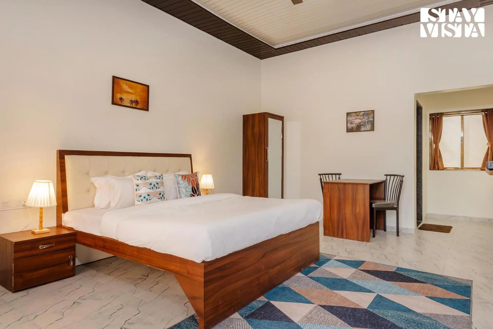 Bedroom, Bed in Mango Splash by VEO - Part of StayVista