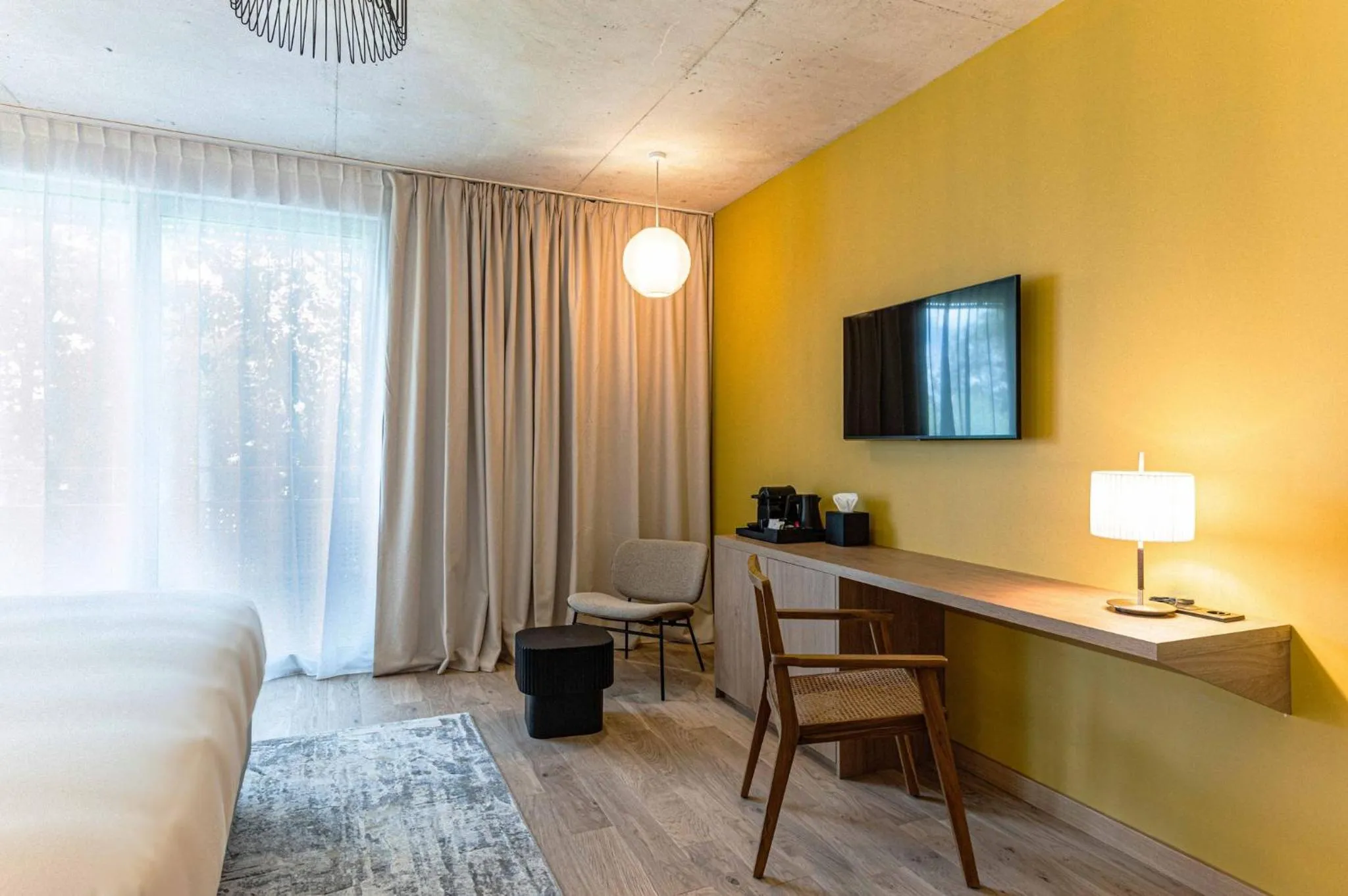 Photo of the whole room, Bed in voco Beaune , Cité des Vins by IHG