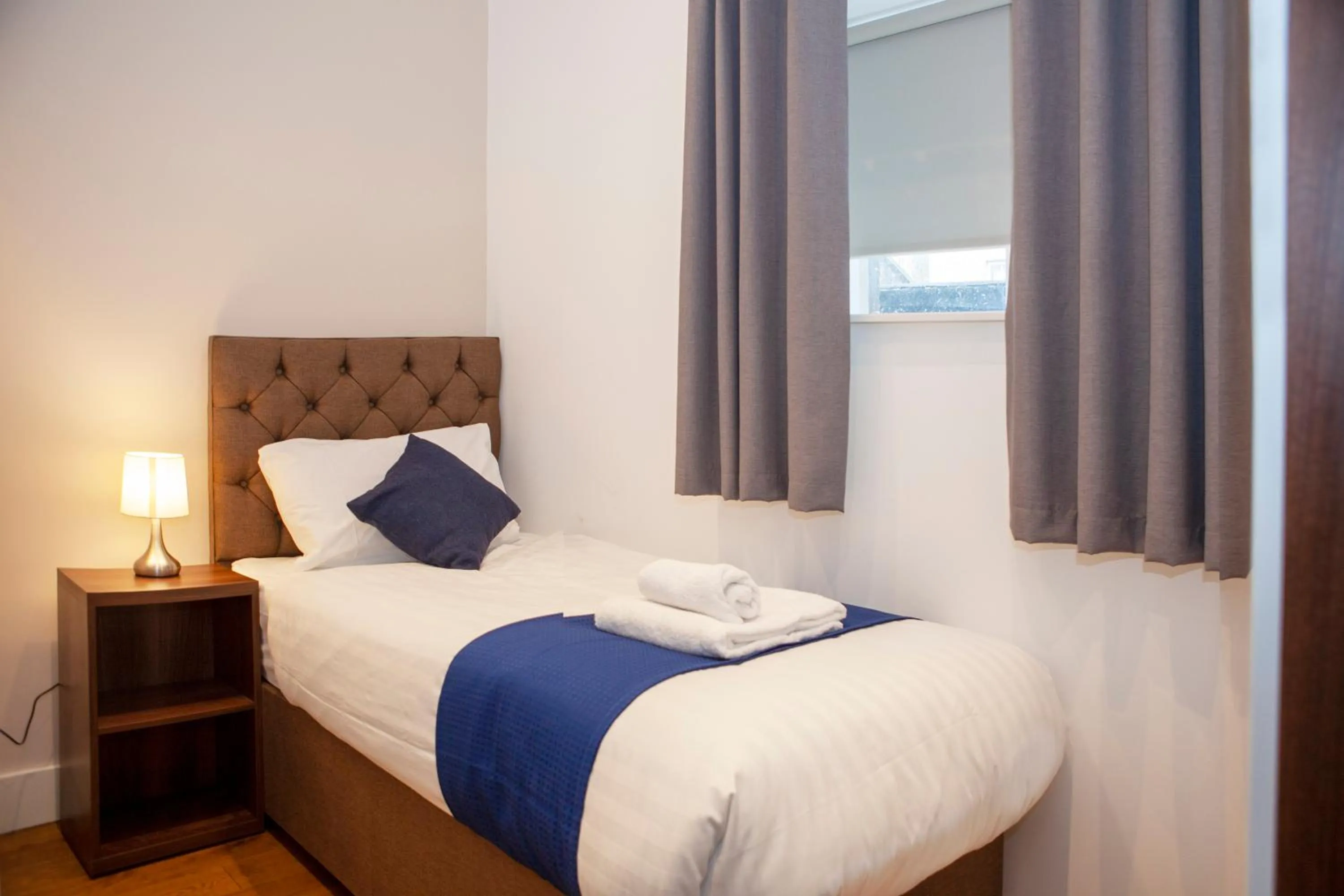 Bed in Putera Puteri Residence