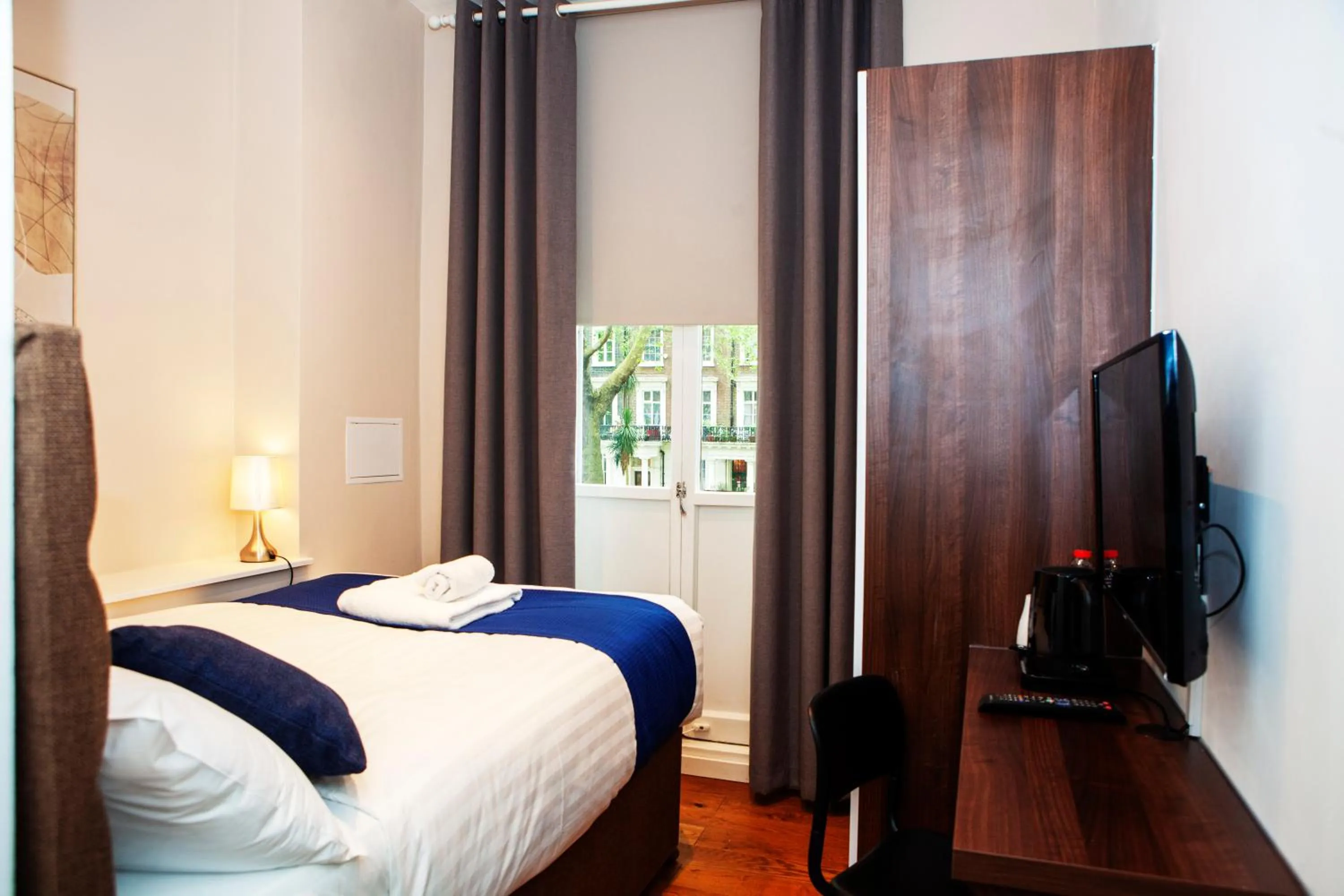 Bed in Putera Puteri Residence