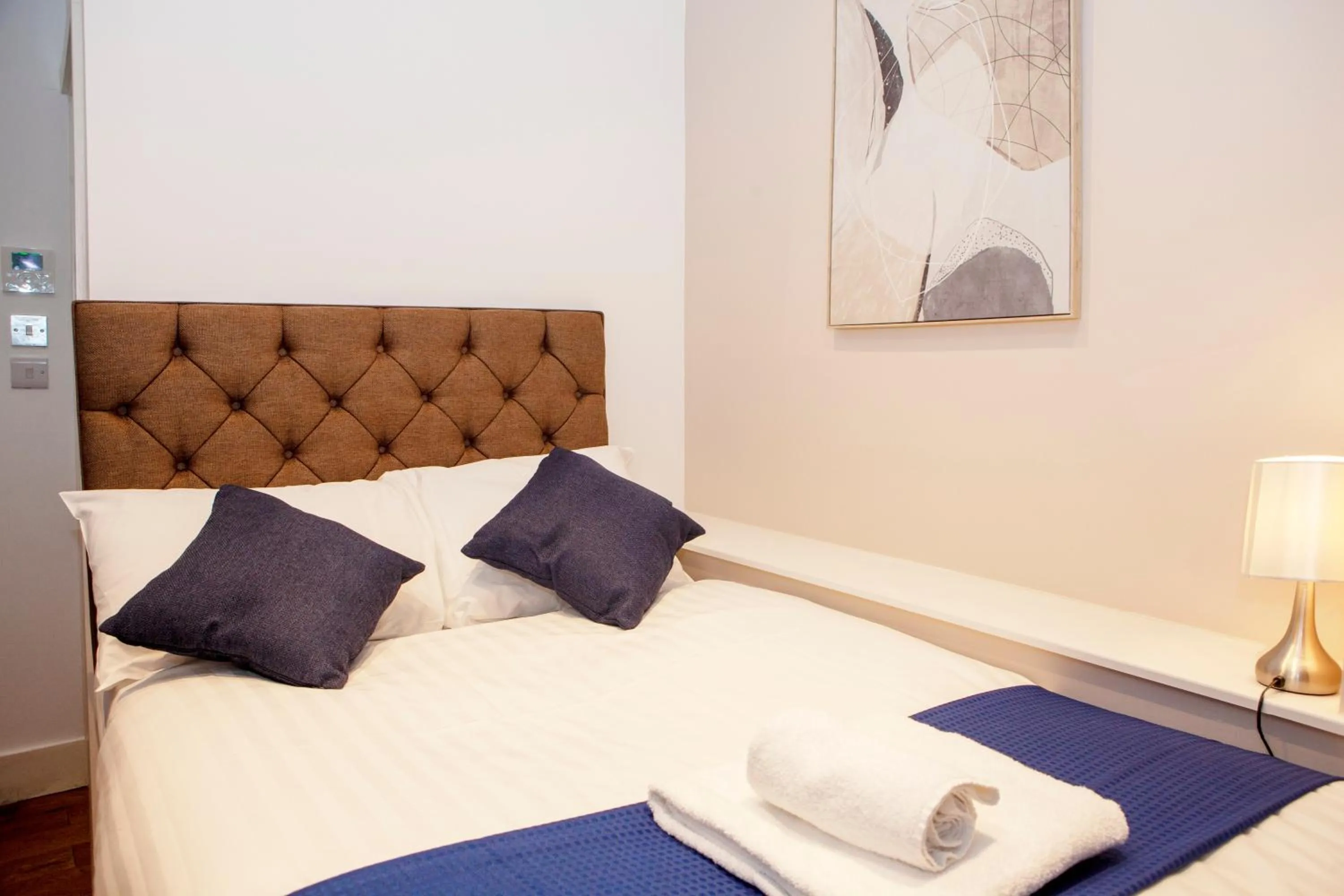 Bed in Putera Puteri Residence