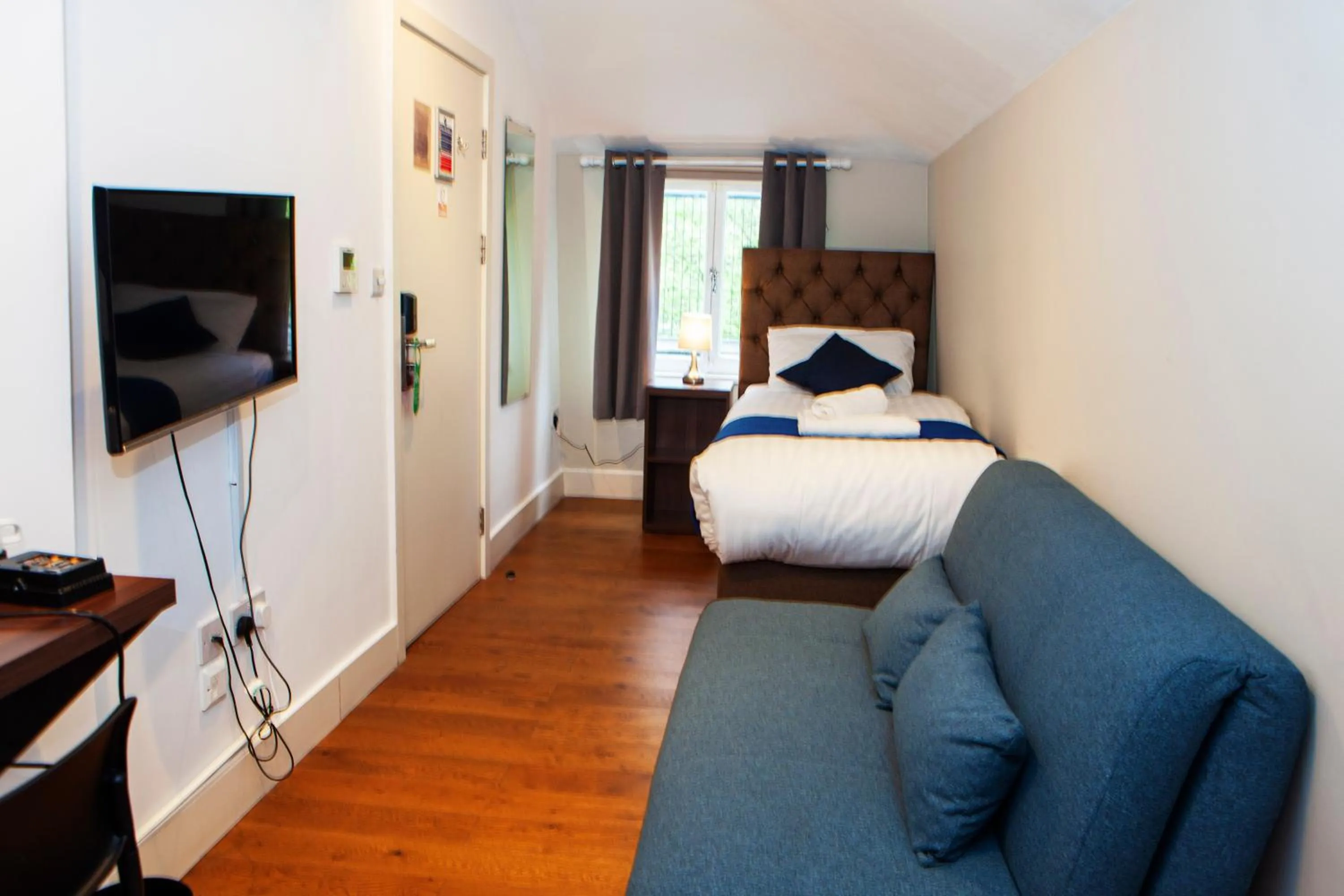 Bed in Putera Puteri Residence