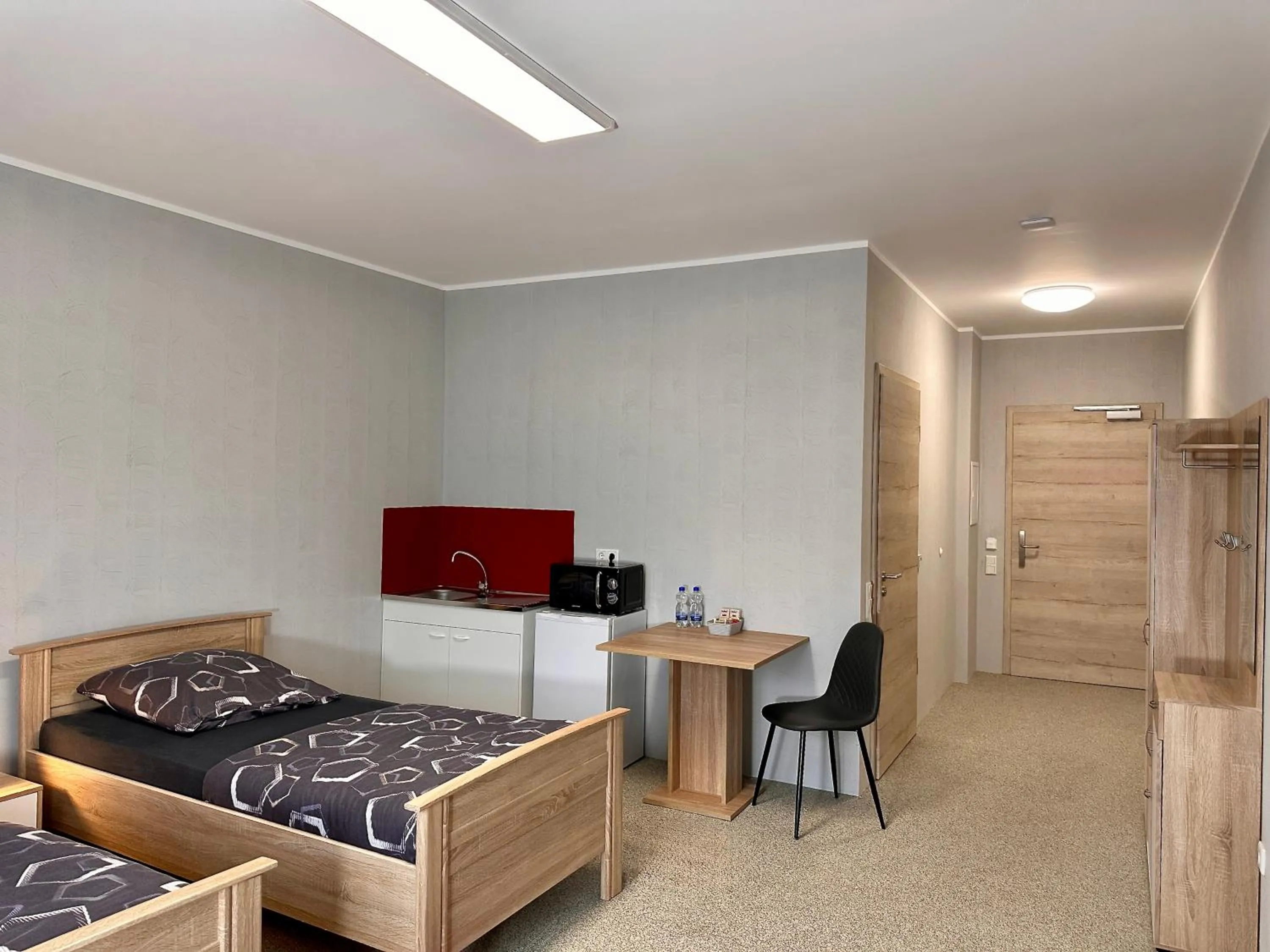 Photo of the whole room, Bed in GPHotel/Boardinghaus