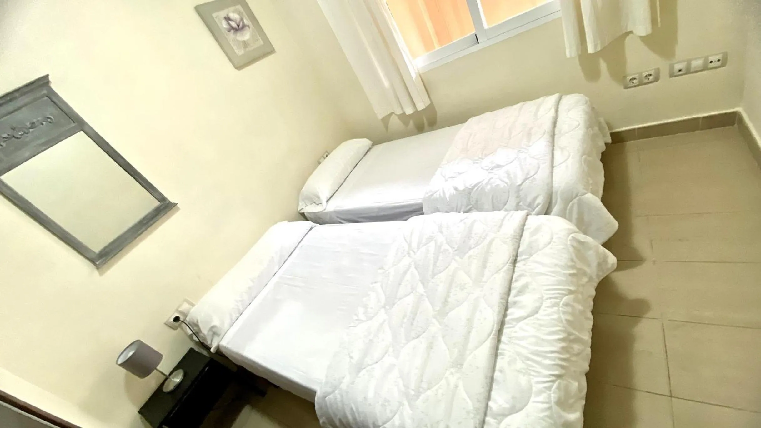 Bedroom, Bed in Apartamentos Carlton VyB