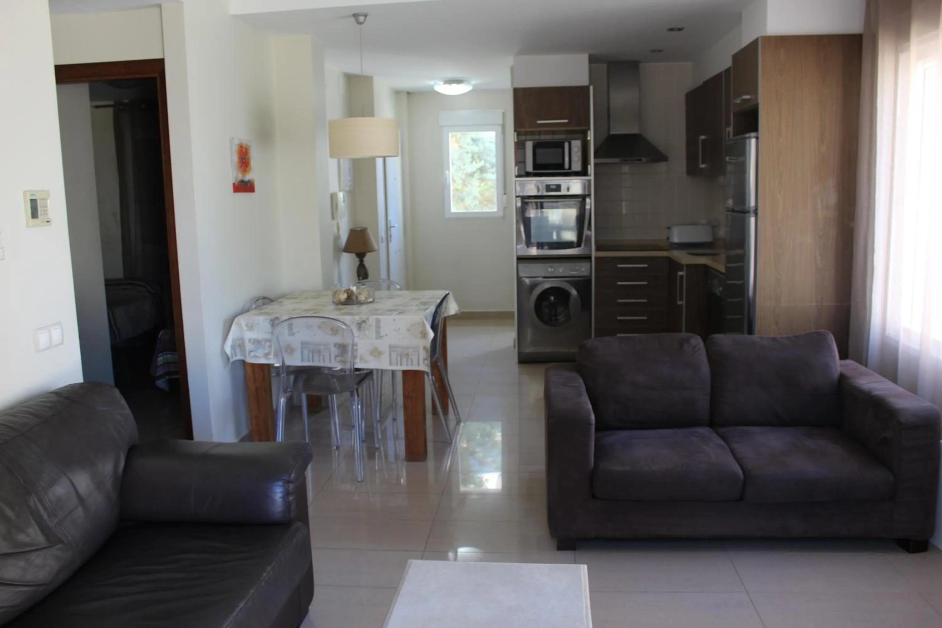 Kitchen or kitchenette in Apartamentos Carlton VyB