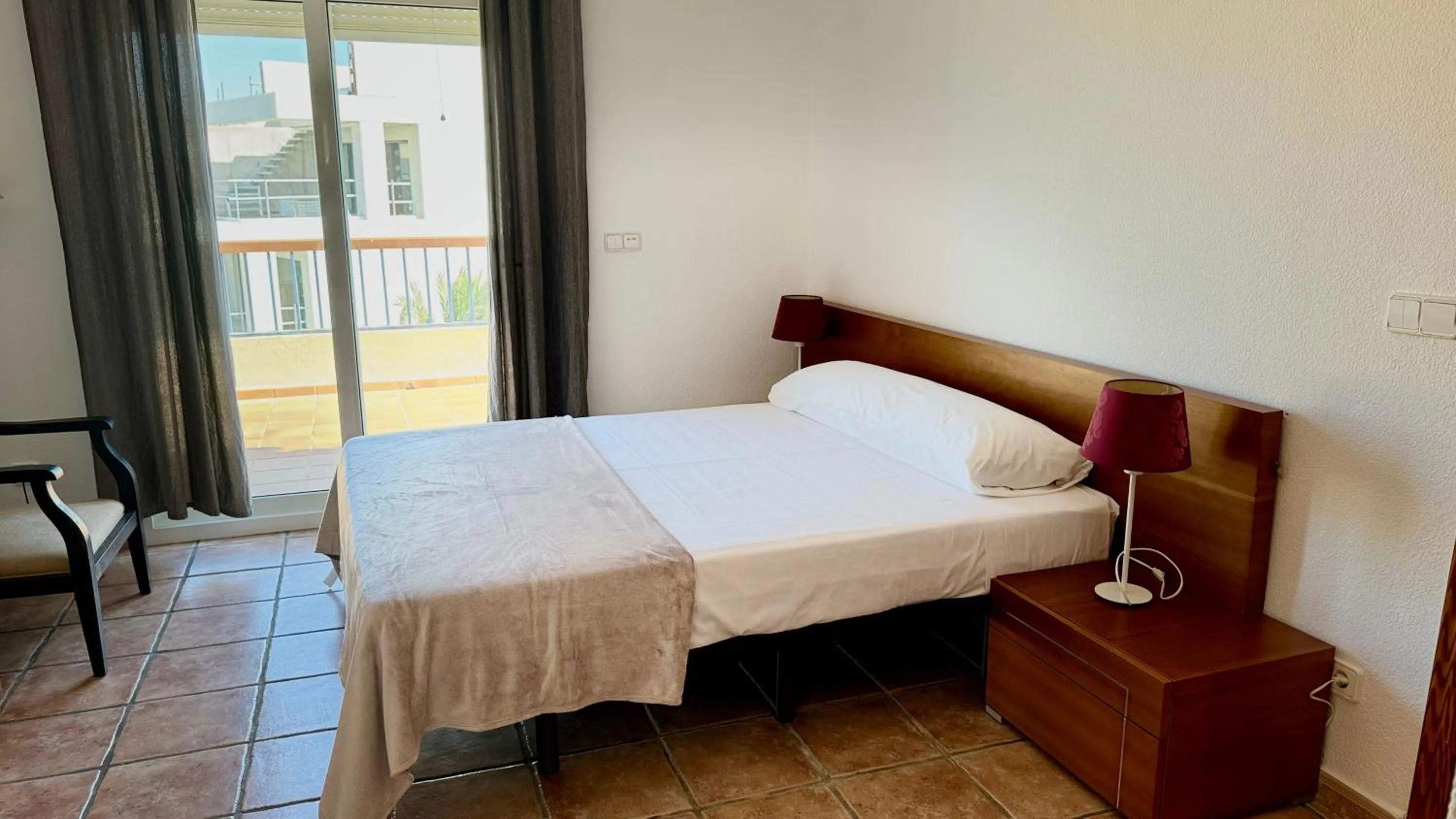 Bedroom, Bed in Apartamentos Carlton VyB