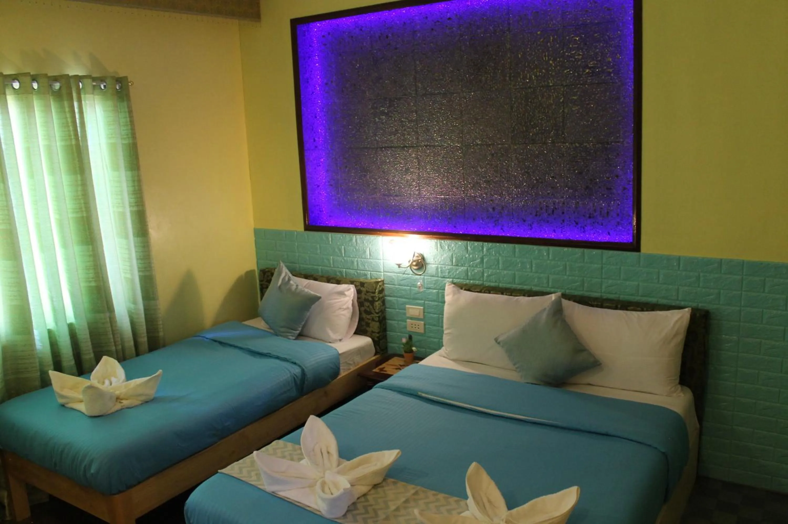 Bed in Kojie Guest House