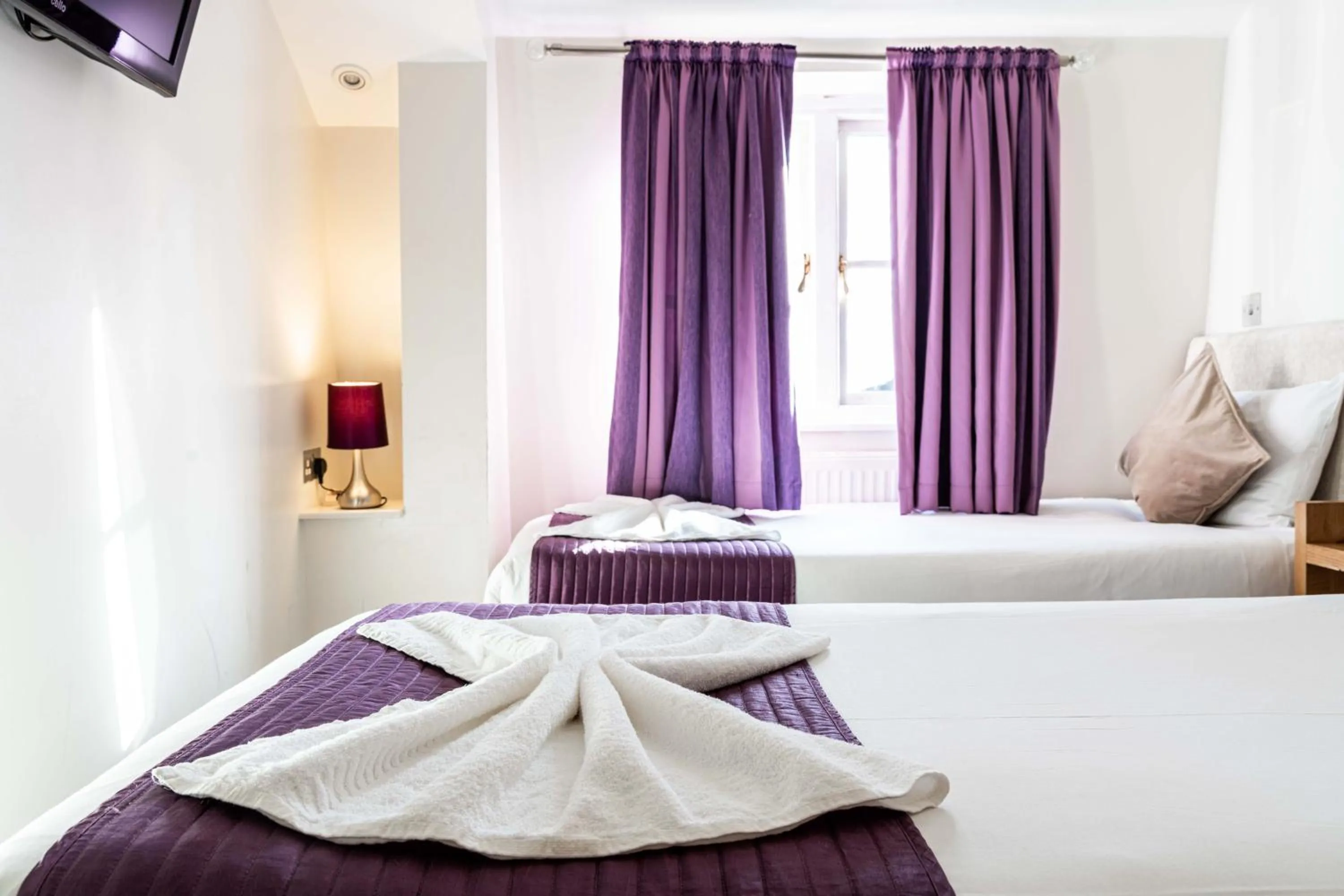 Bed in Lancaster Court Hotel