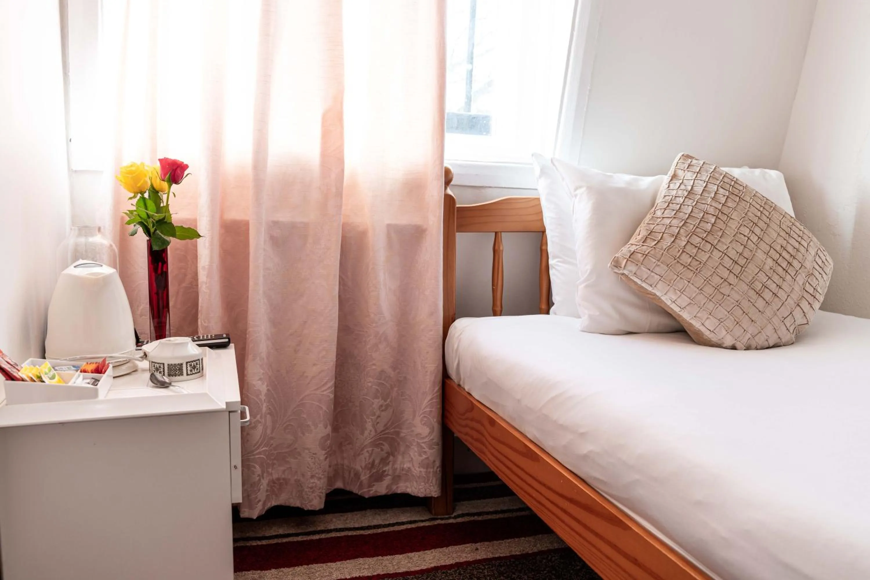 Bed in Lancaster Court Hotel