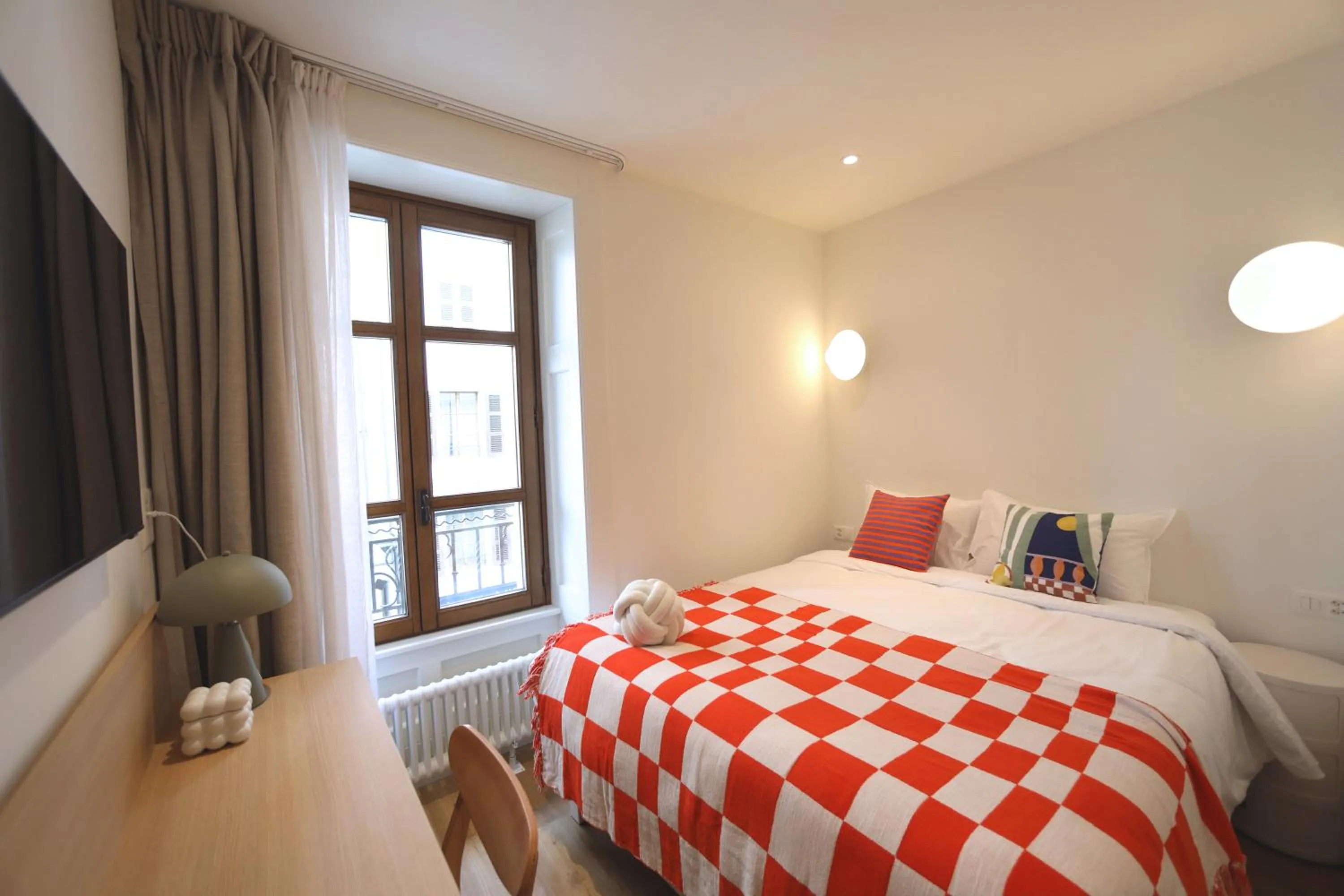 Bed in Rhodania Boutique Hôtel