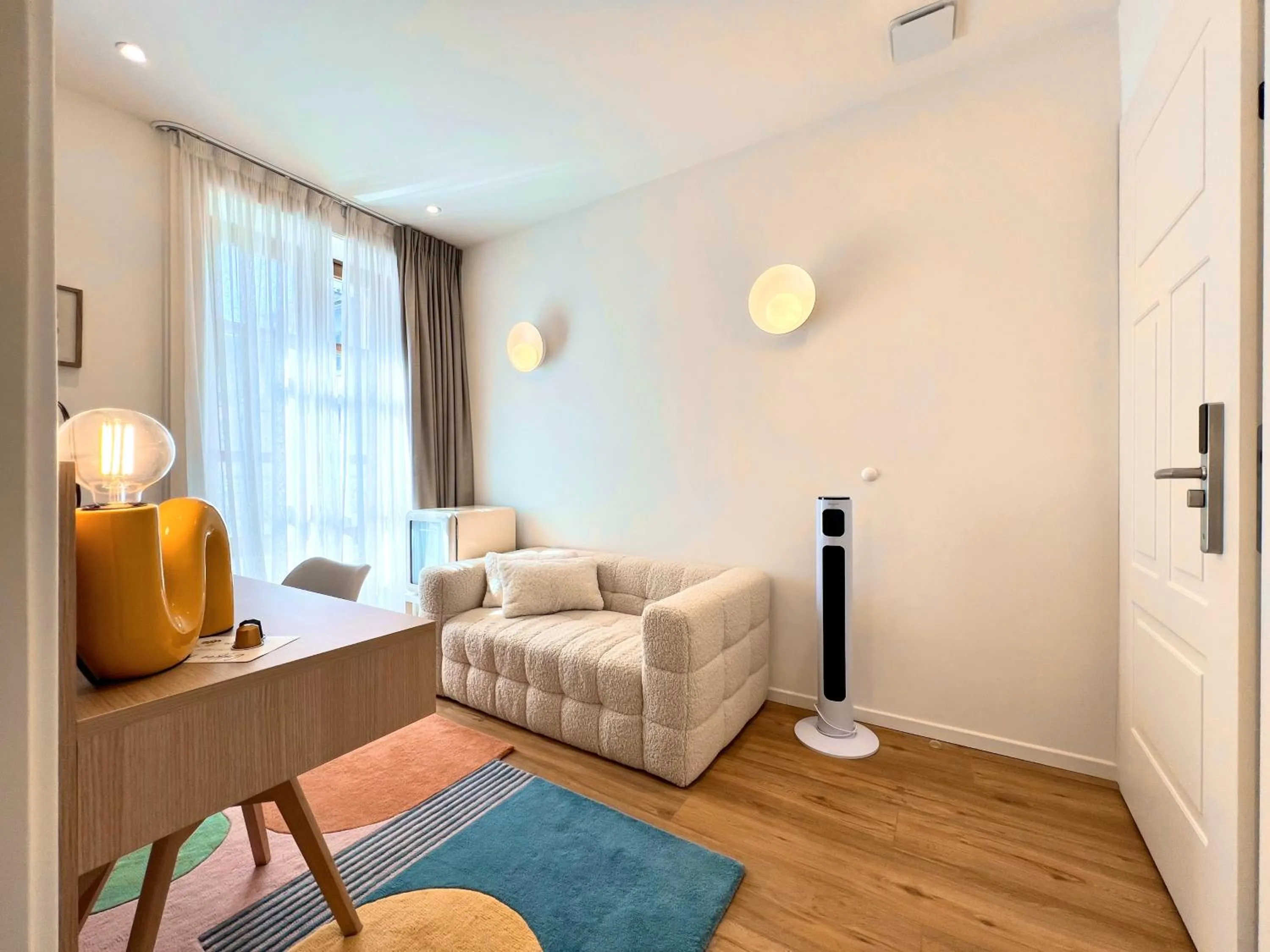 Living room, Bed in Rhodania Boutique Hôtel