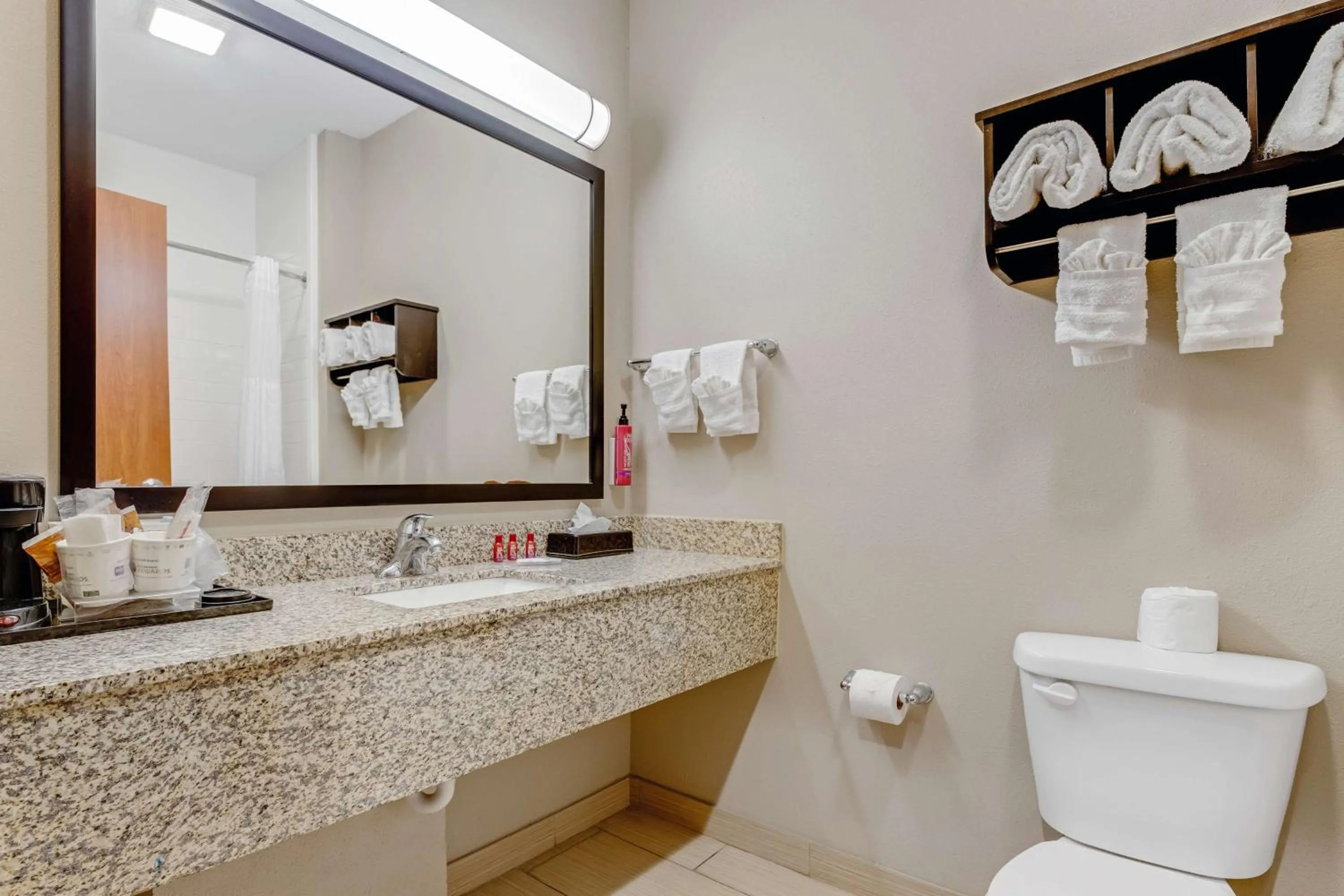 Bathroom in SureStay Plus Hotel by Best Western Owasso Tulsa North
