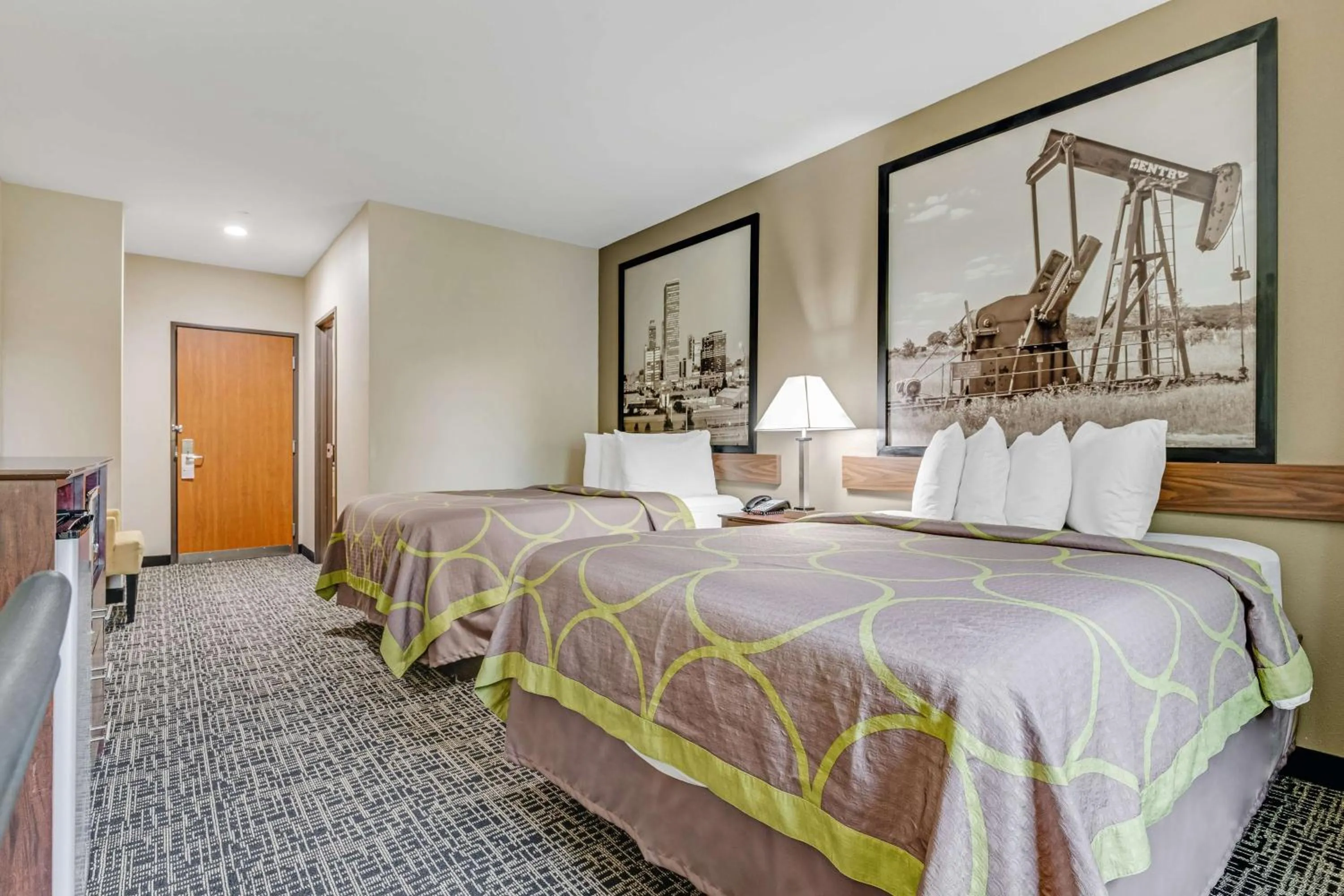 Bedroom, Bed in SureStay Plus Hotel by Best Western Owasso Tulsa North