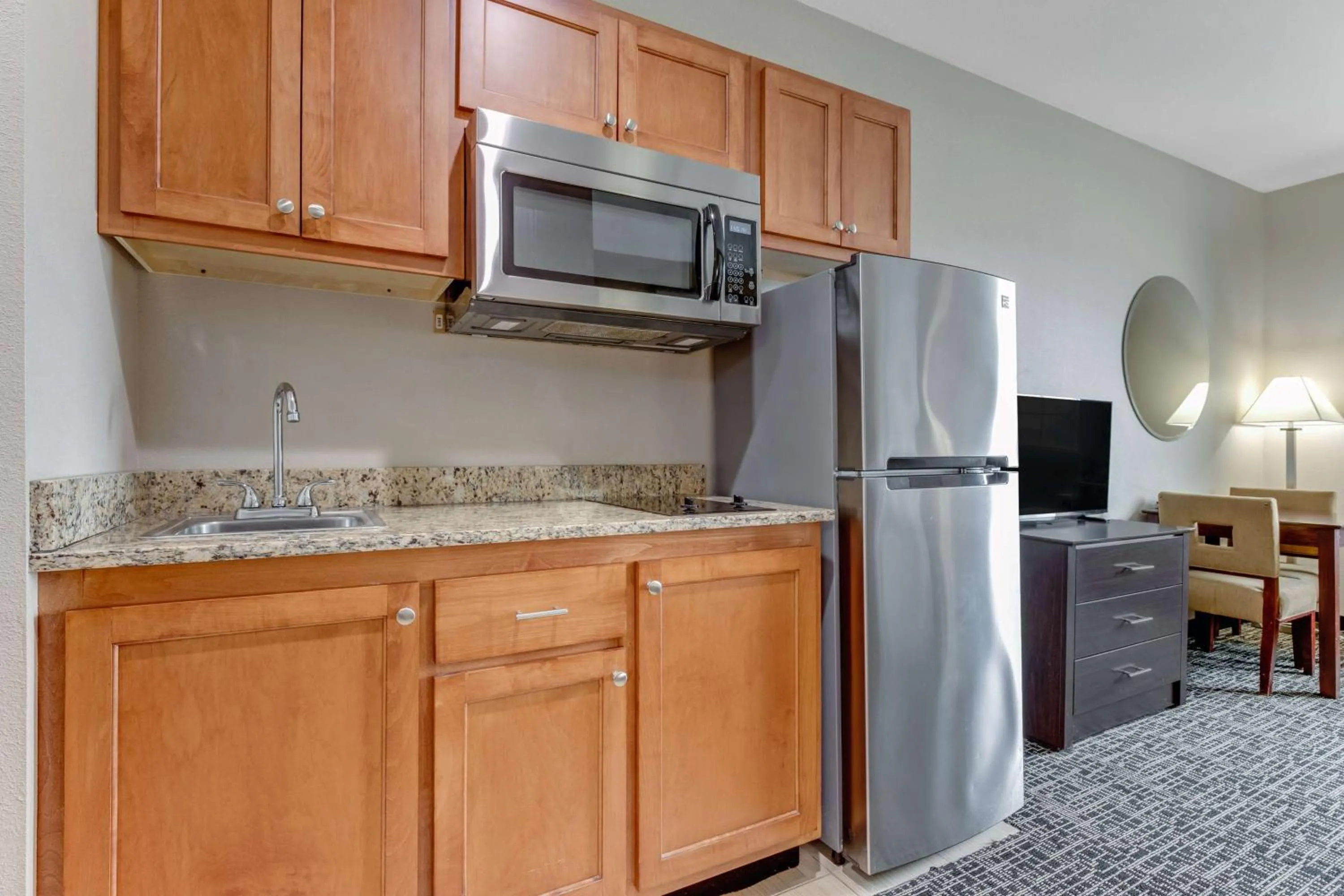 Bedroom in SureStay Plus Hotel by Best Western Owasso Tulsa North