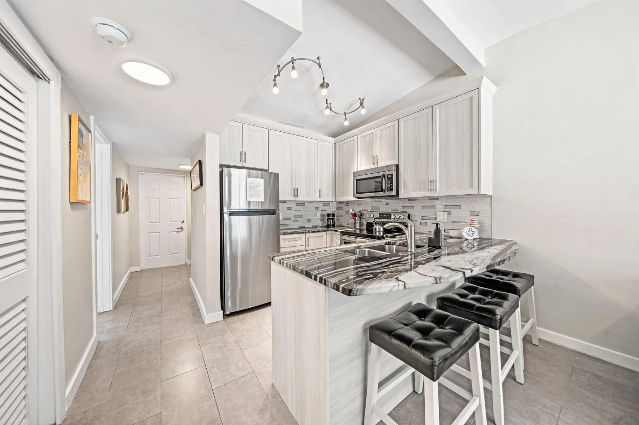 Kitchen or kitchenette in The Banana River Resort