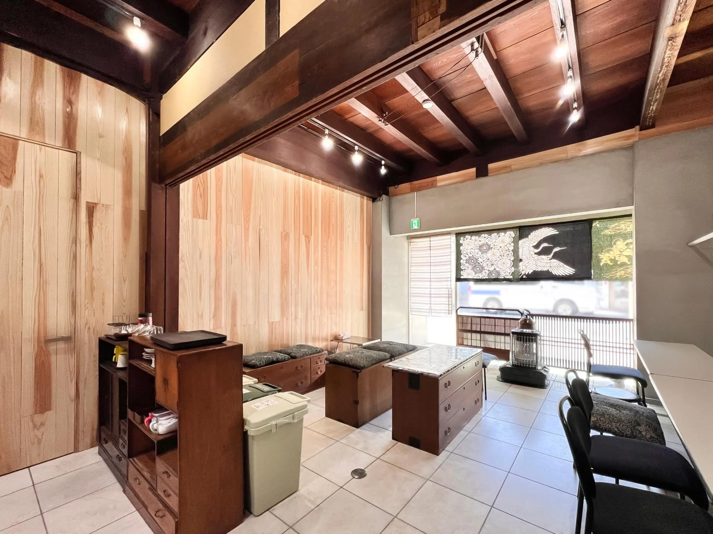 Communal lounge/ TV room in Hostel Miyagawa by Murasaki