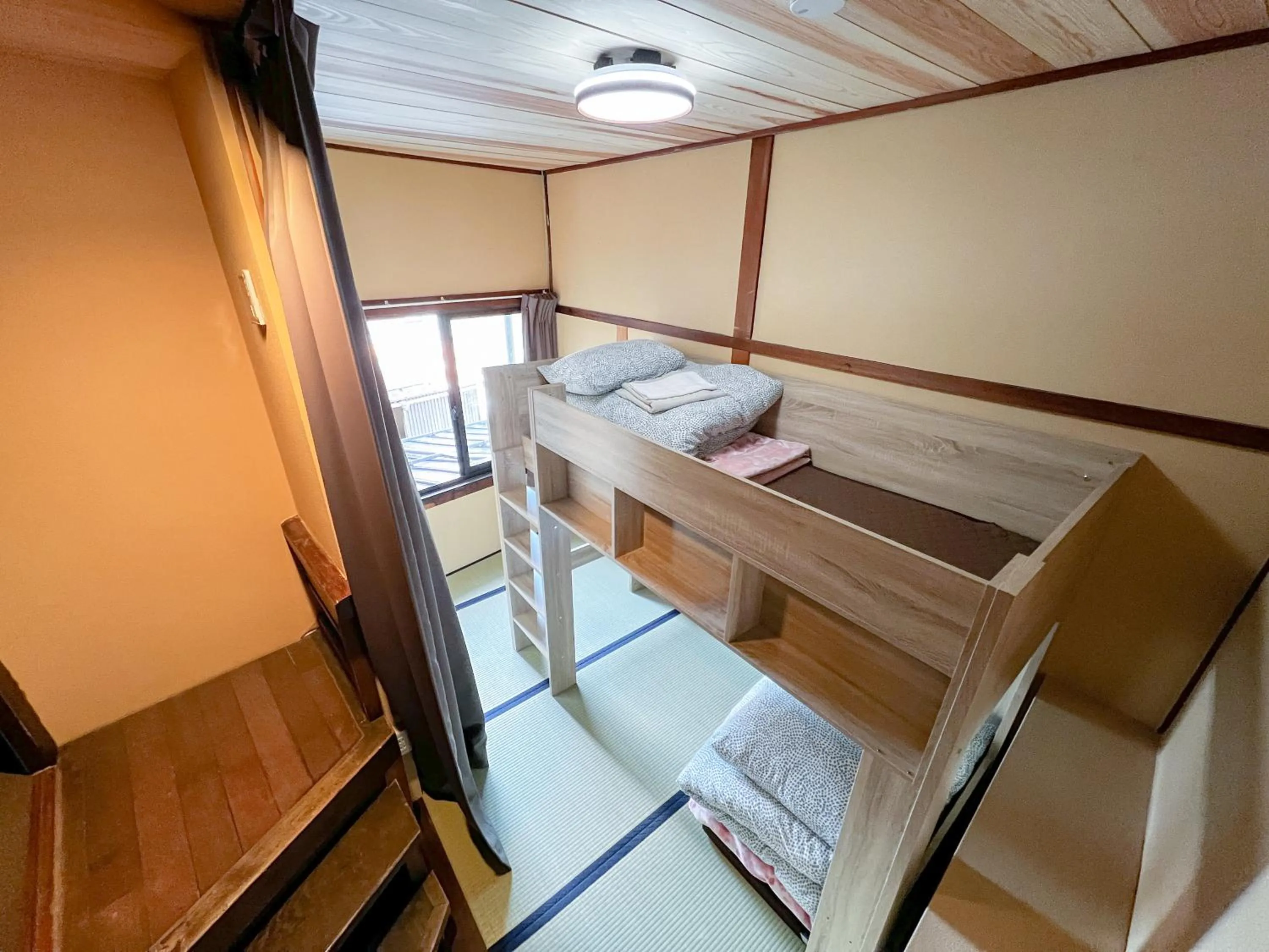 Bed in Hostel Miyagawa by Murasaki