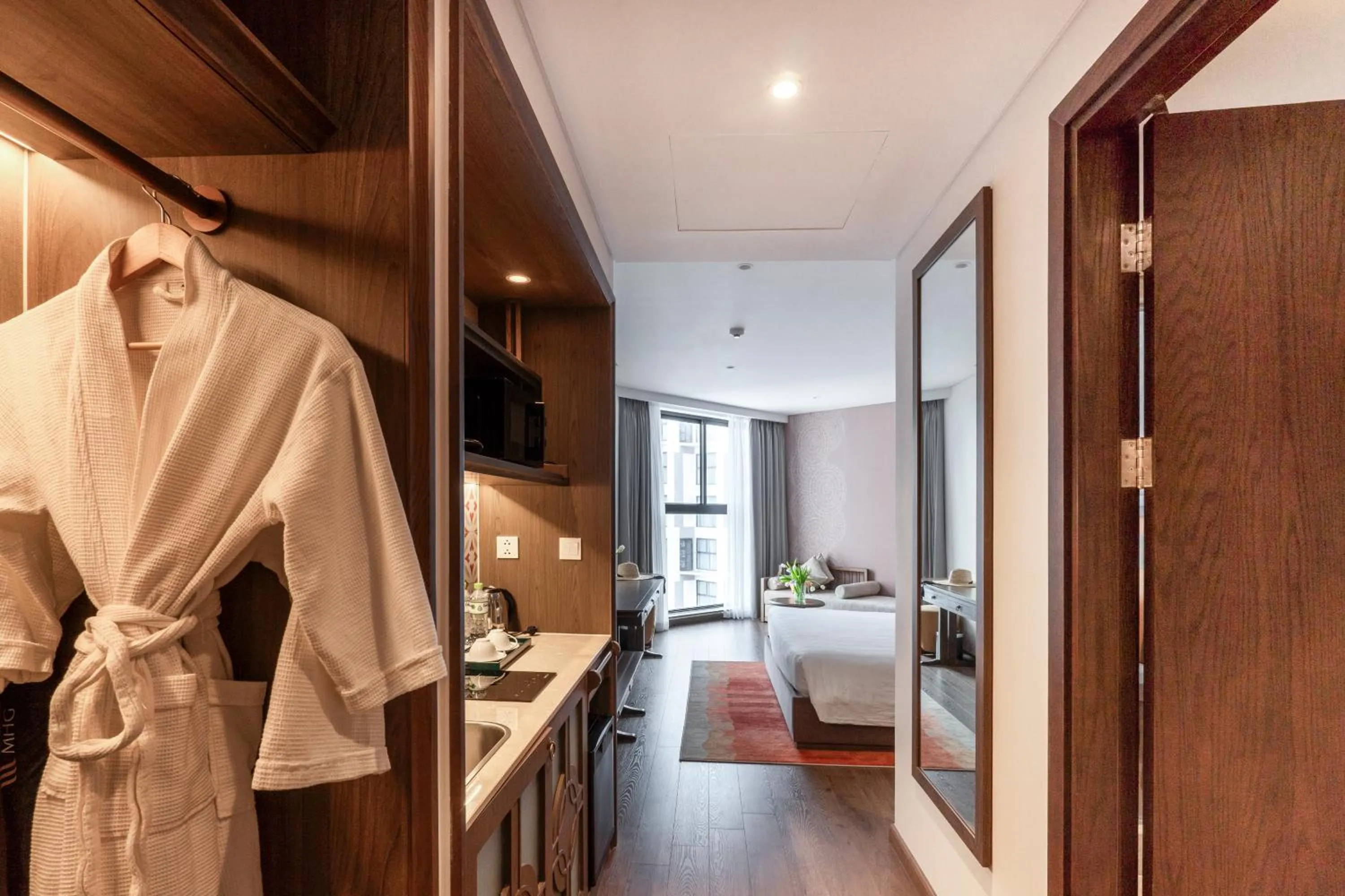 Kitchen or kitchenette, Bed in Mandala Apartment & Resort Chambay, Mui Ne - By B4B & S3