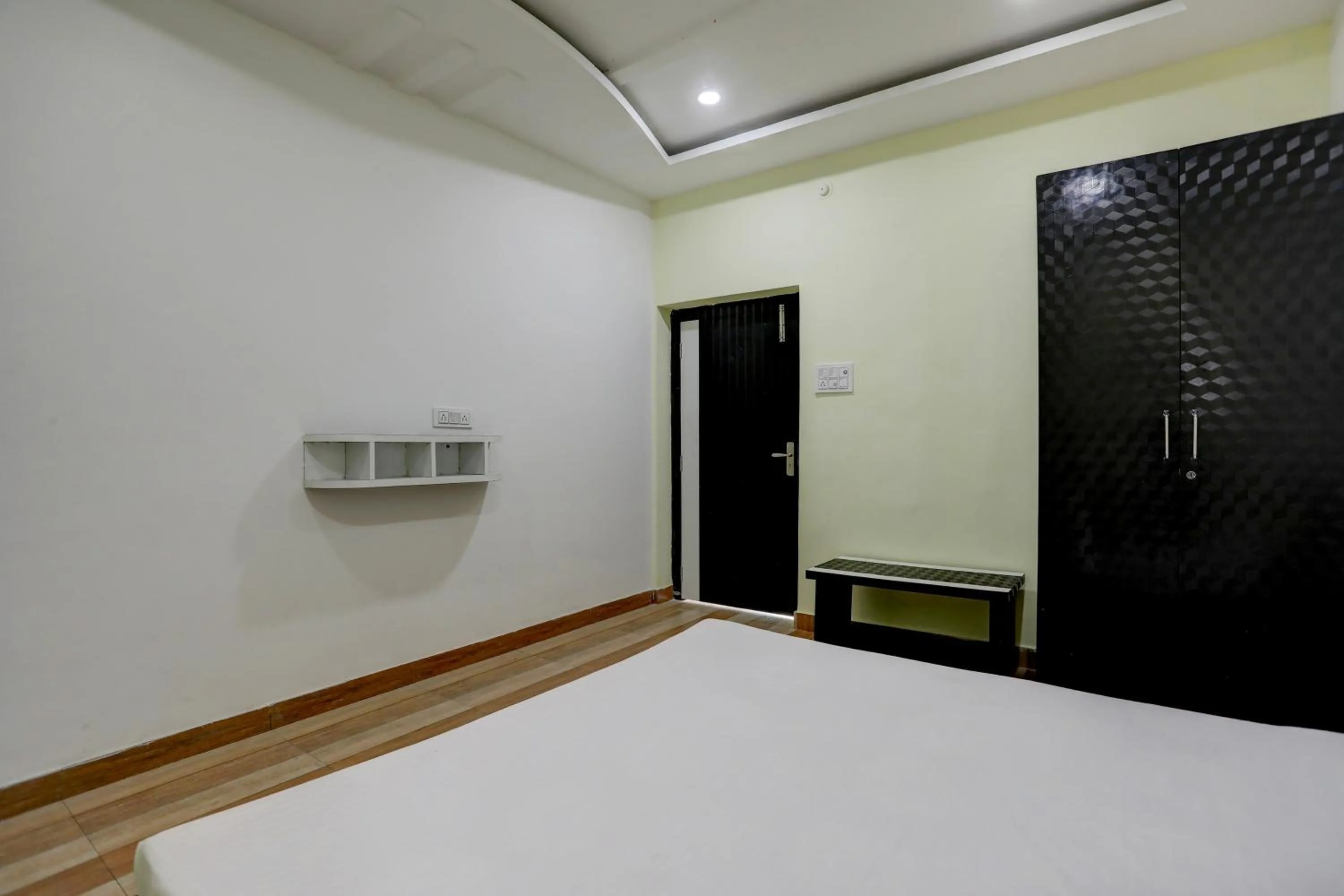 Bedroom in Super Hotel O The Nirvana Resorts