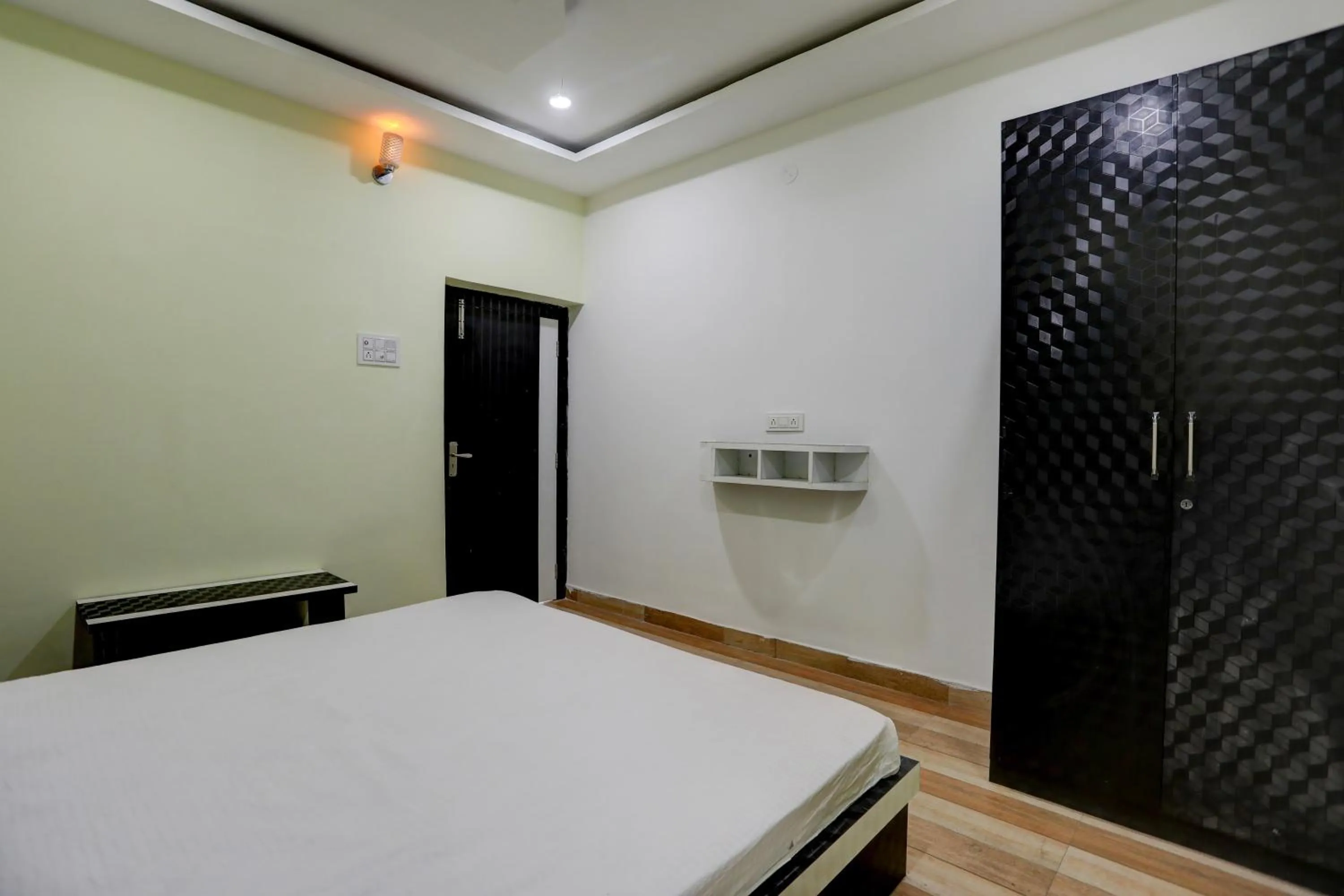 Bedroom in Super Hotel O The Nirvana Resorts