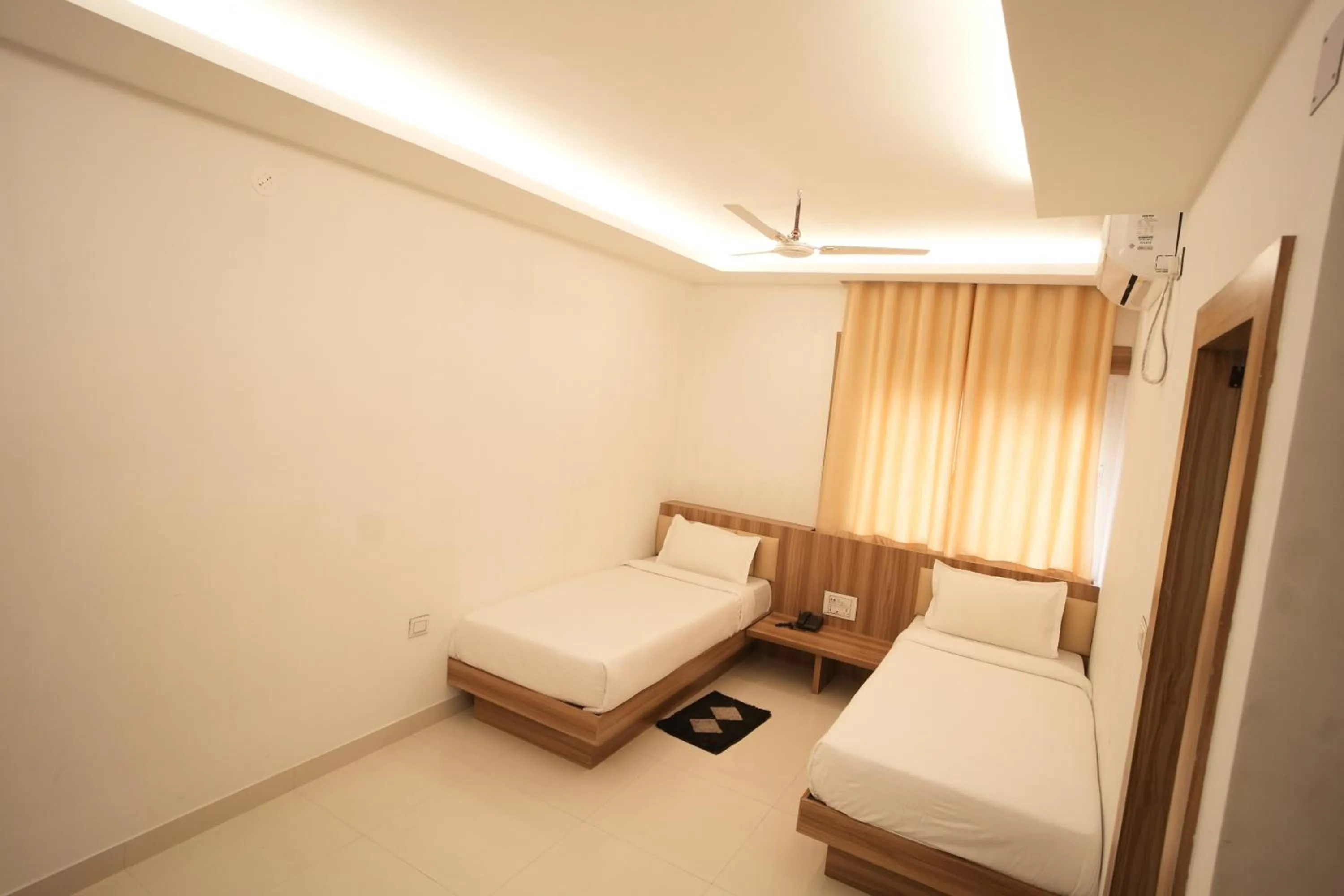 Bed in Hotel Shanti International